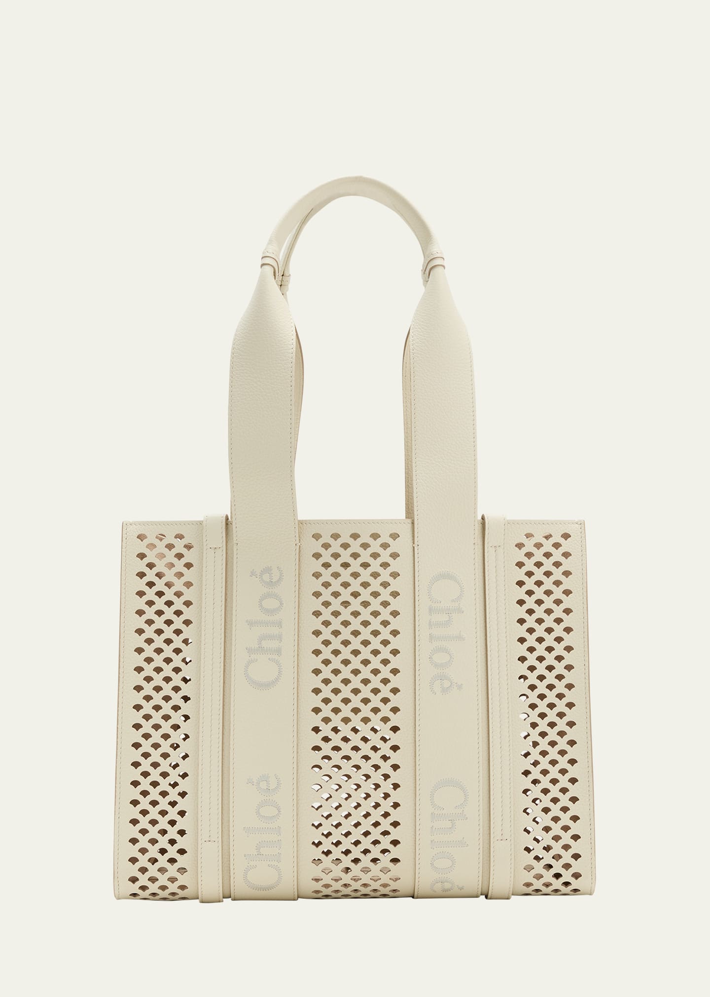 Perforated leather store See by Chloe wristlet clutch