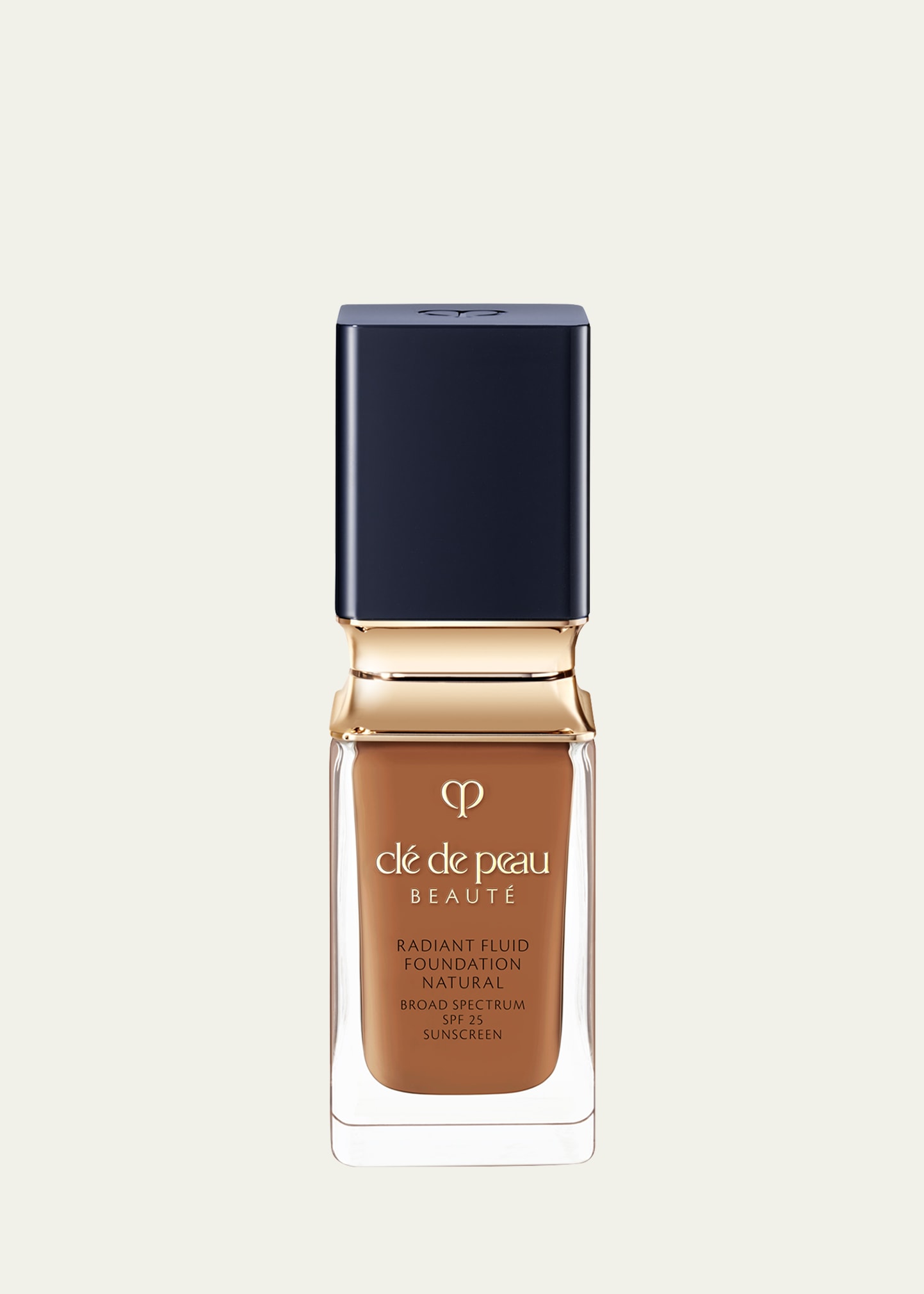 Clé De Peau Beauté 1.1 Oz. Radiant Fluid Foundation Natural Broad Spectrum Spf 25 Sunscreen In O90 Very Deep Och