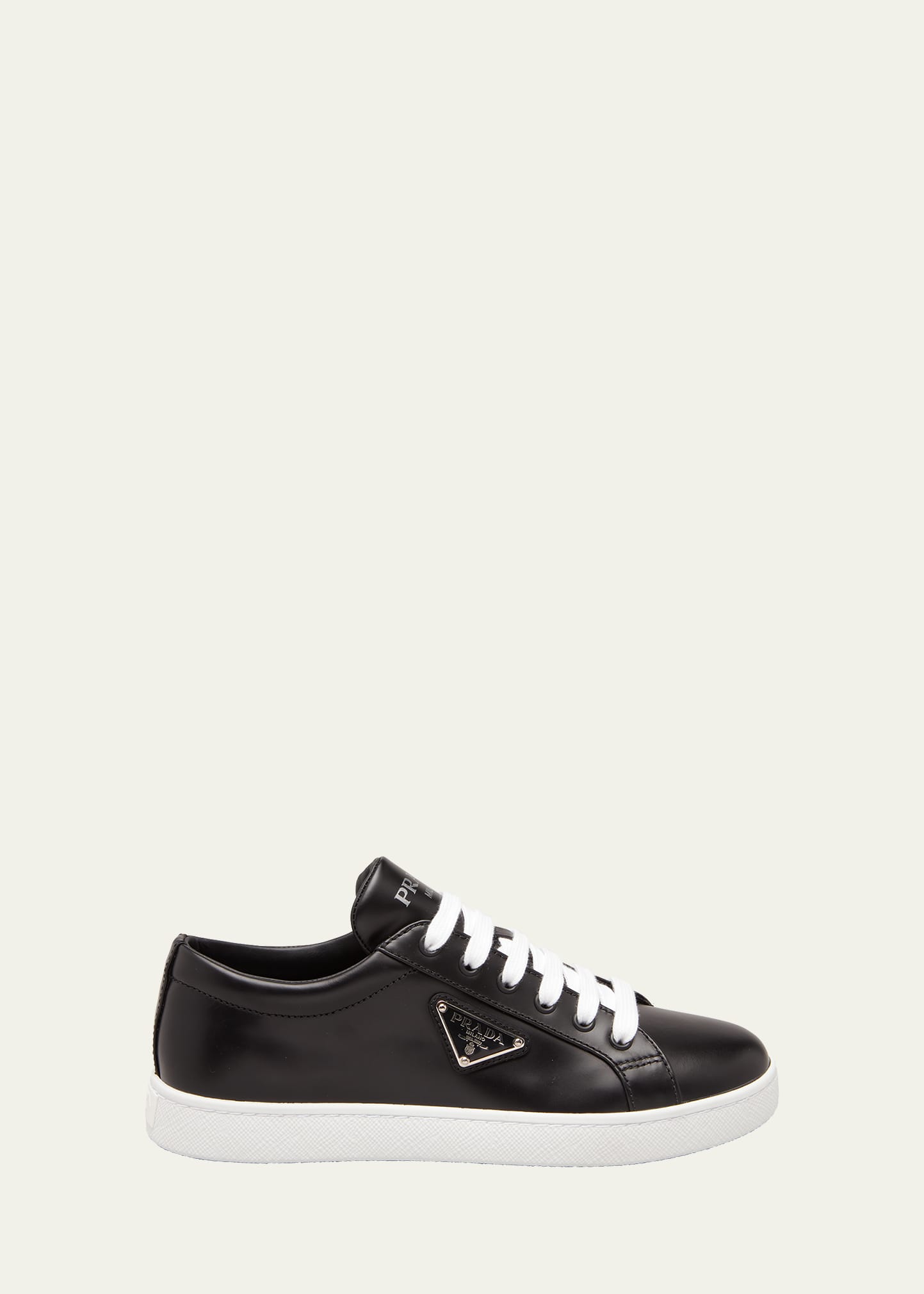 Prada Gold Logo Leather Low-top Sneakers In Nero 1