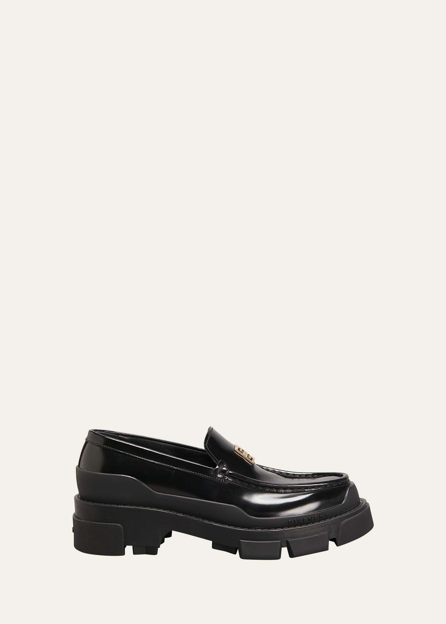 Givenchy Terra Calfskin Medallion Loafers In Black