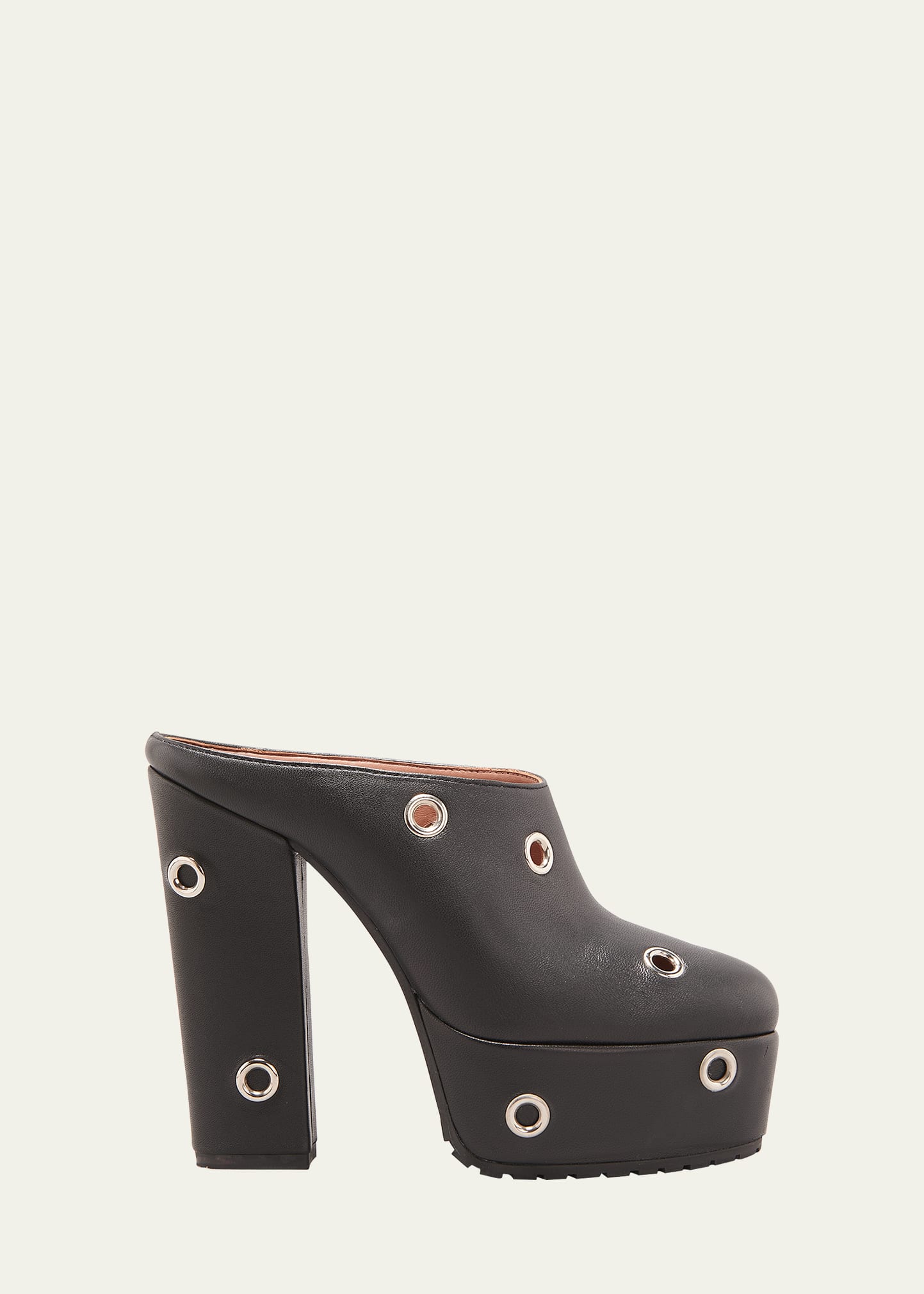 ALAÏA LEATHER GROMMET PLATFORM MULES