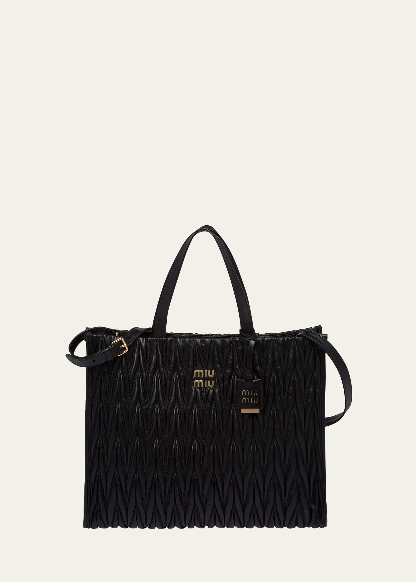 Miu Miu Quilted Leather Top-handle Bag In Black
