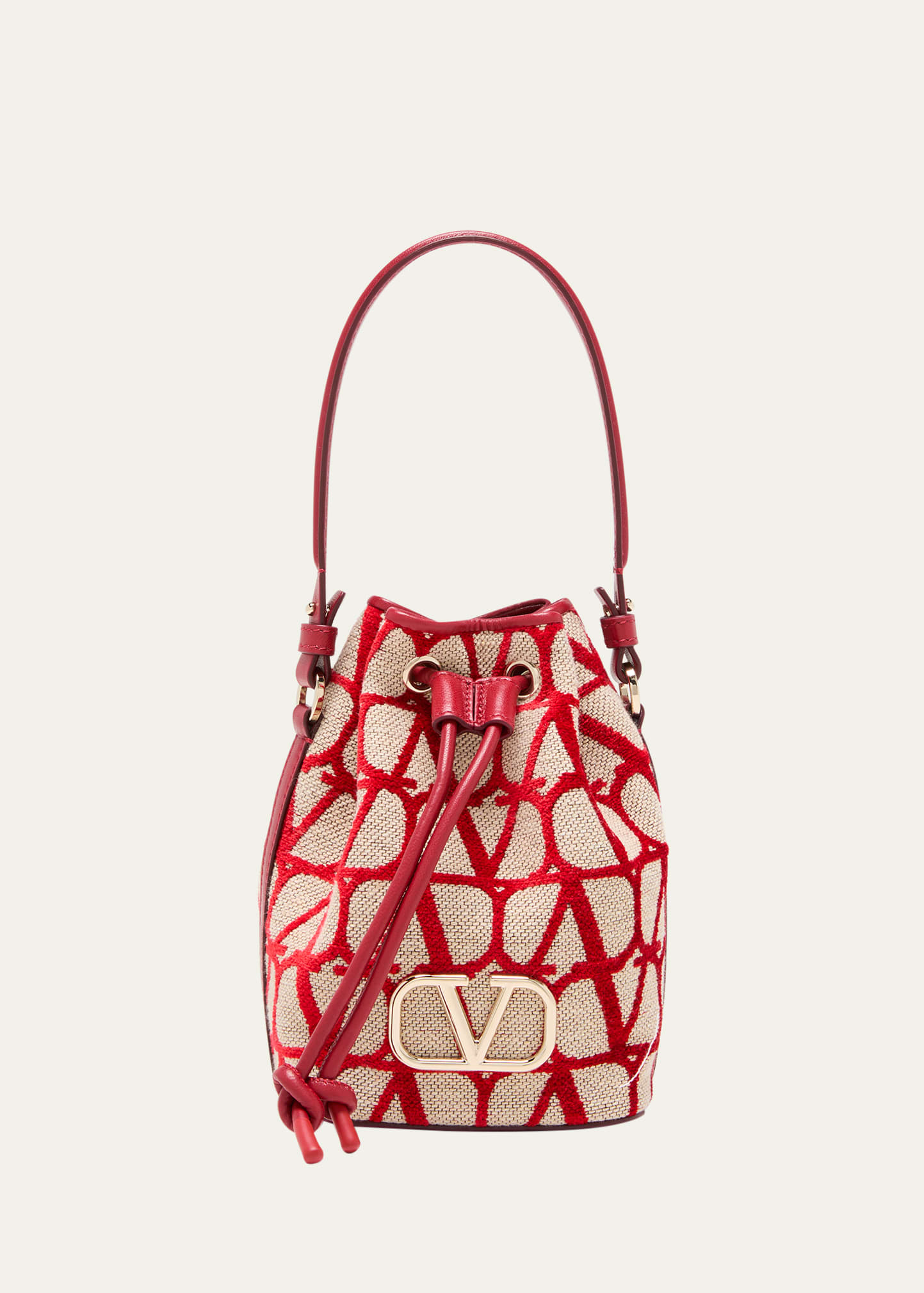 Shop Valentino Garavani Mini Bucket Bag in Canvas