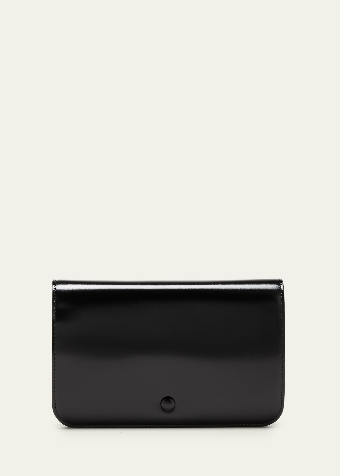 THE ROW GUSSET CLUTCH BAG IN CALFSKIN LEATHER