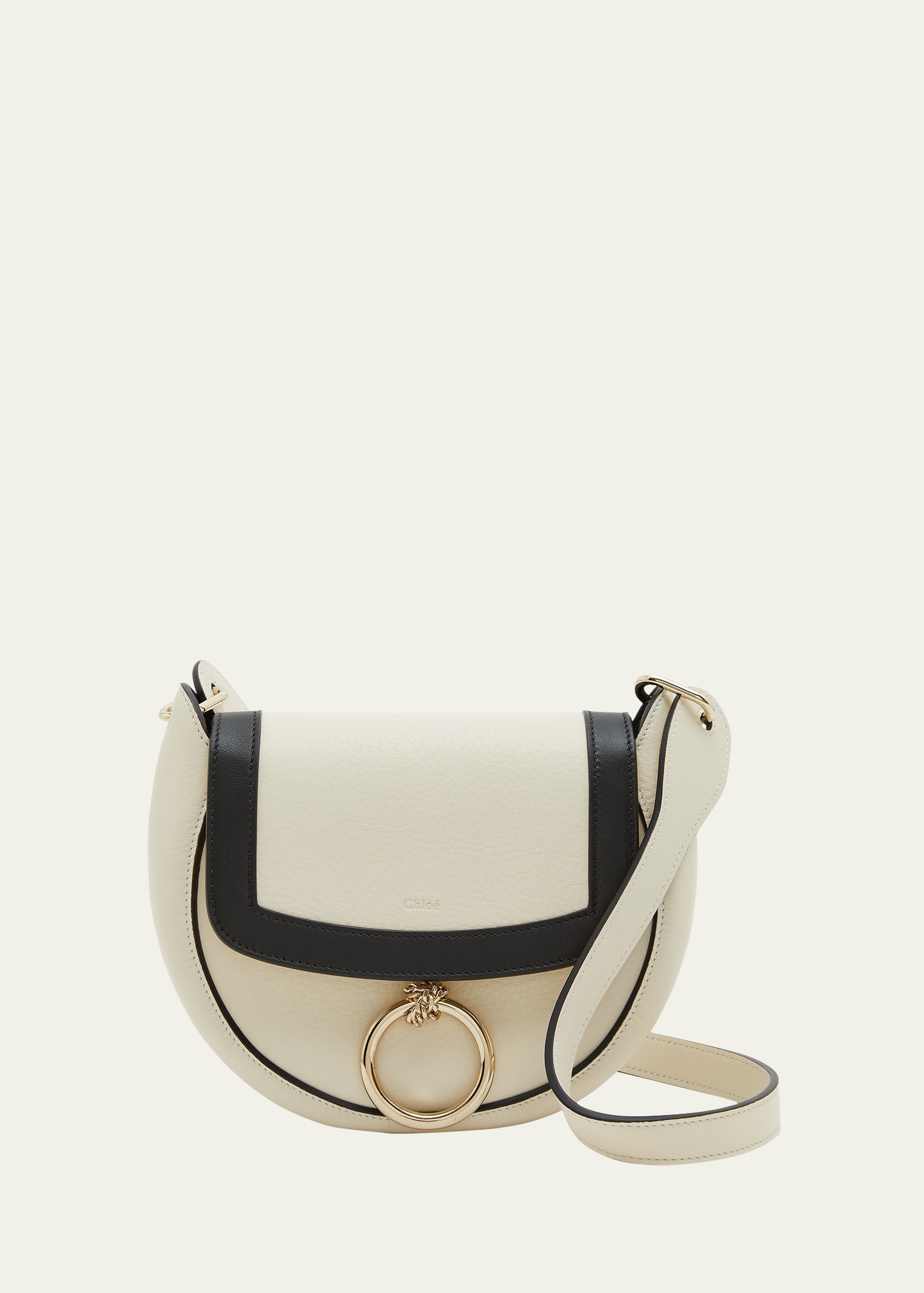 Shop Chloé Arlene Small Grained Leather Saddle Crossbody Bag In 101 White