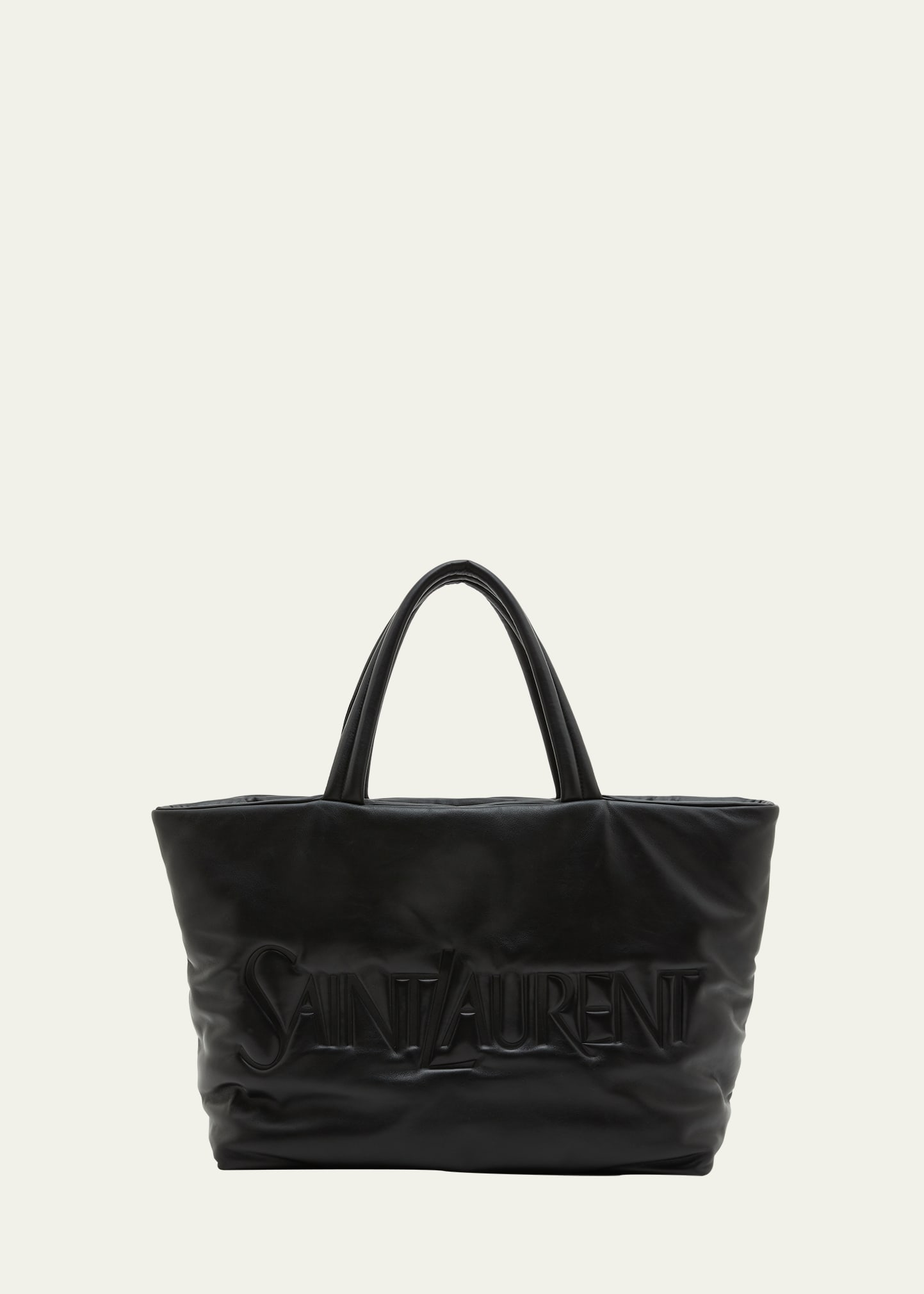 Shop Saint Laurent Men's Embossed Padded Leather Tote Bag In Nero