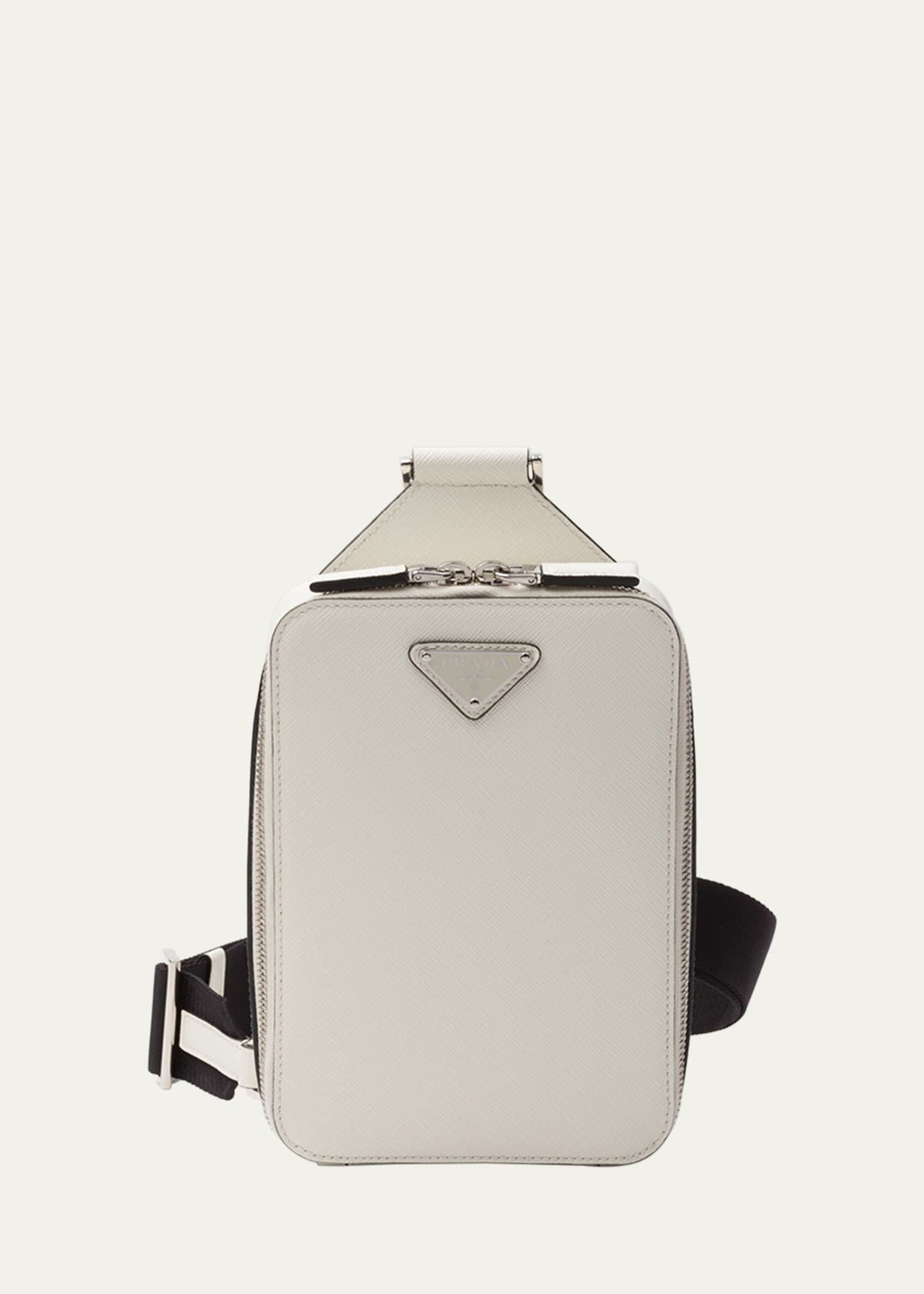 Shop Prada Men's Saffiano Leather Sling Backpack In F0009 Bianco