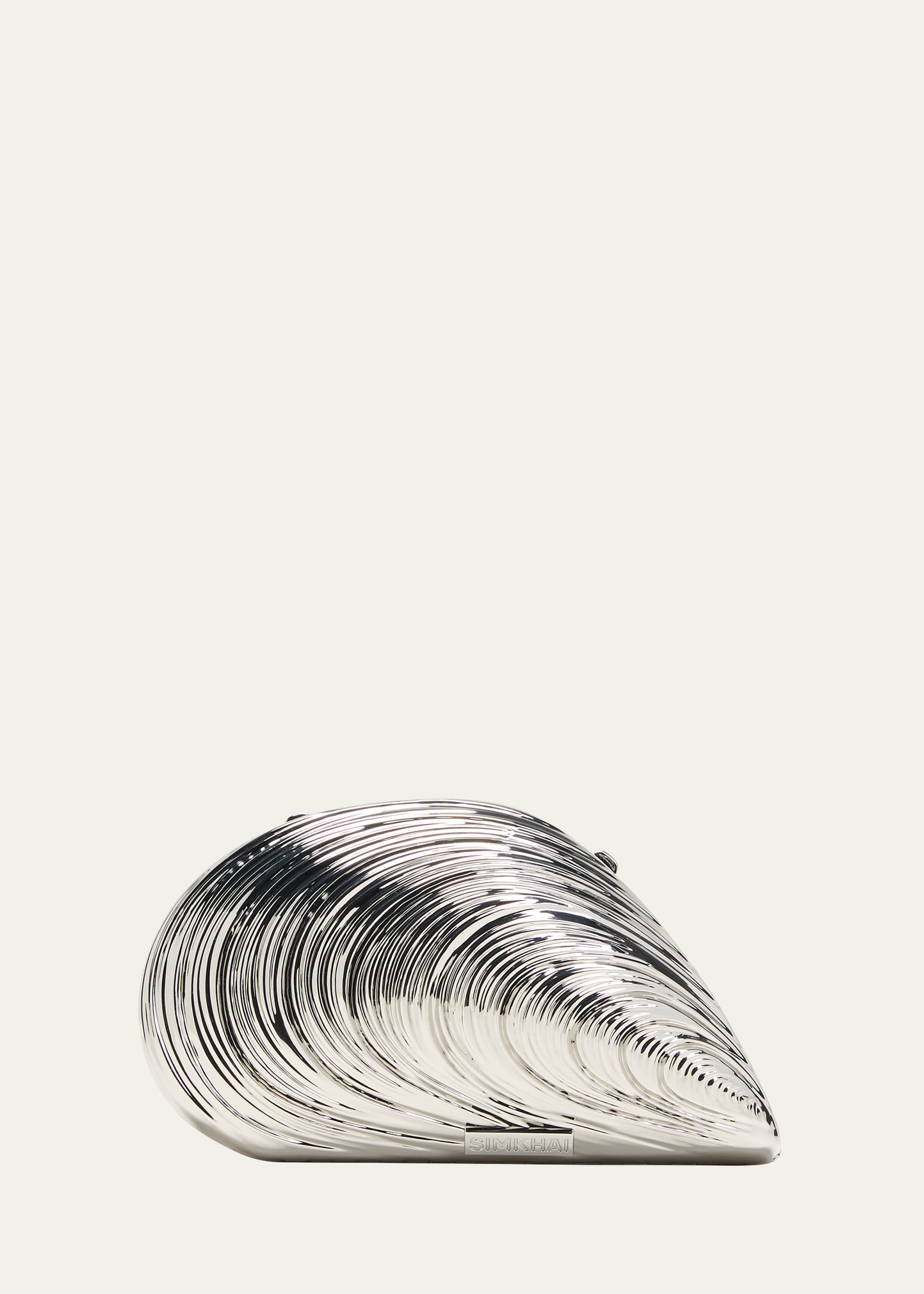 Simkhai Bridget Metal Oyster Shell Clutch Bag In Silver
