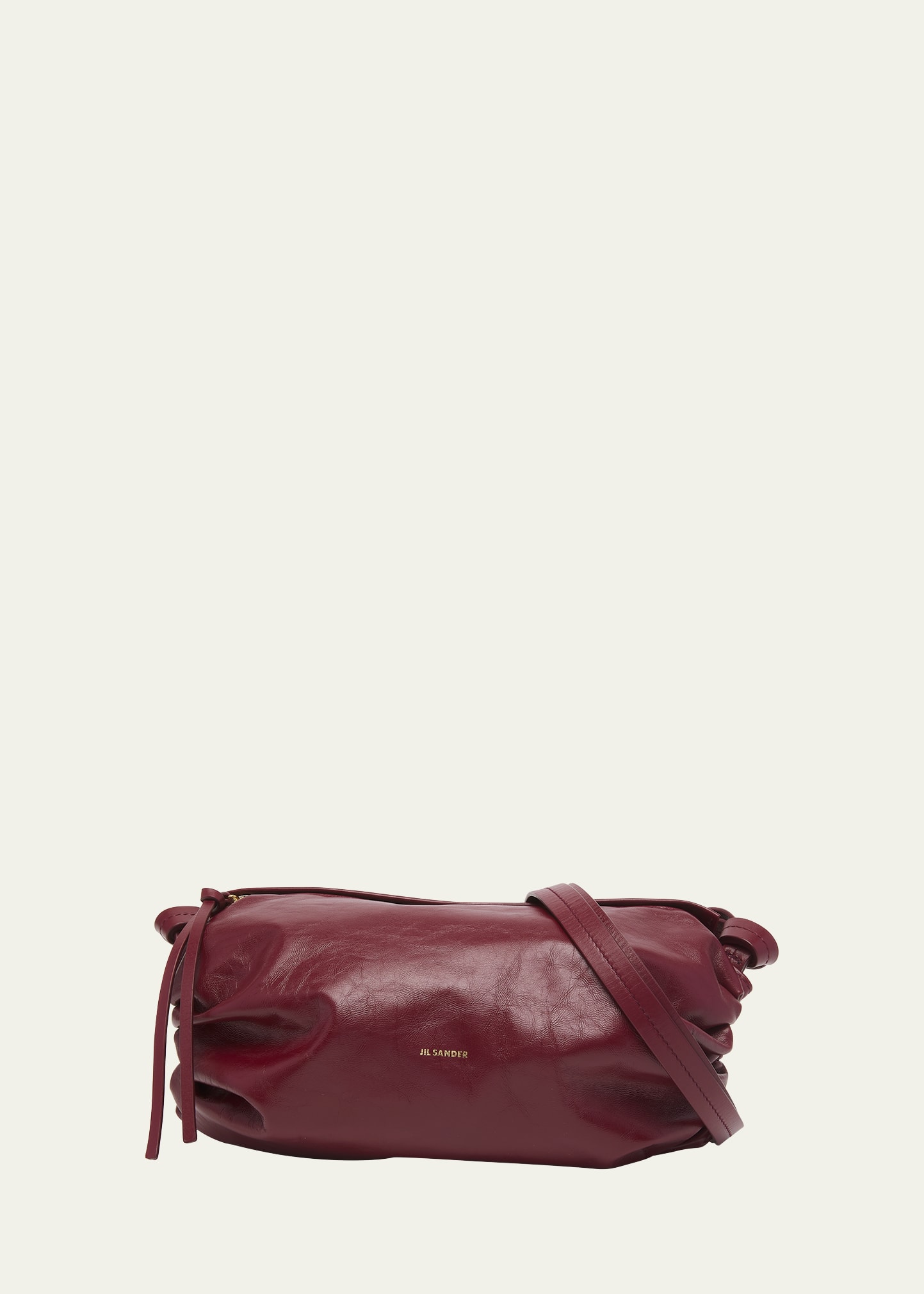 Jil Sander Cushion Small Calfskin Crossbody Bag In 605 Garnet Red