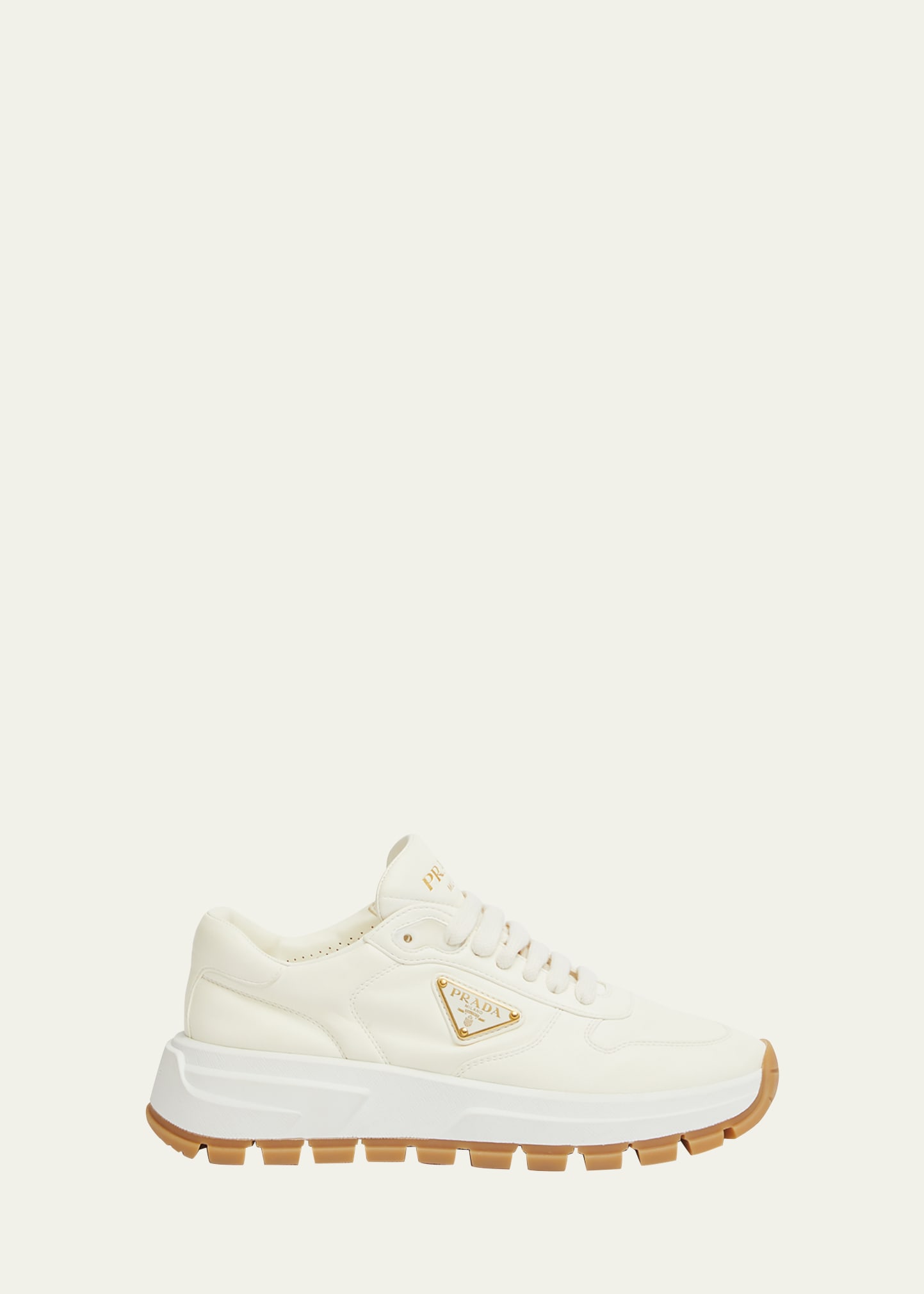 Shop Prada Leather Logo Runner Sneakers In Avorio