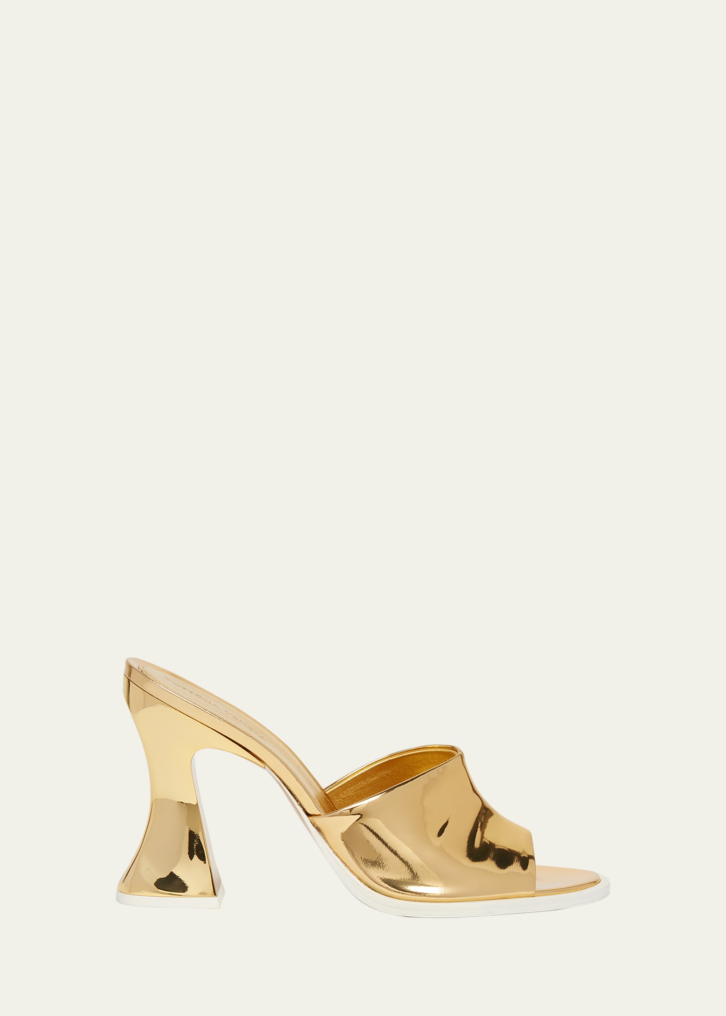 Shop Bottega Veneta Cha Cha Metallic Mule Sandals In 7043 Gold-white