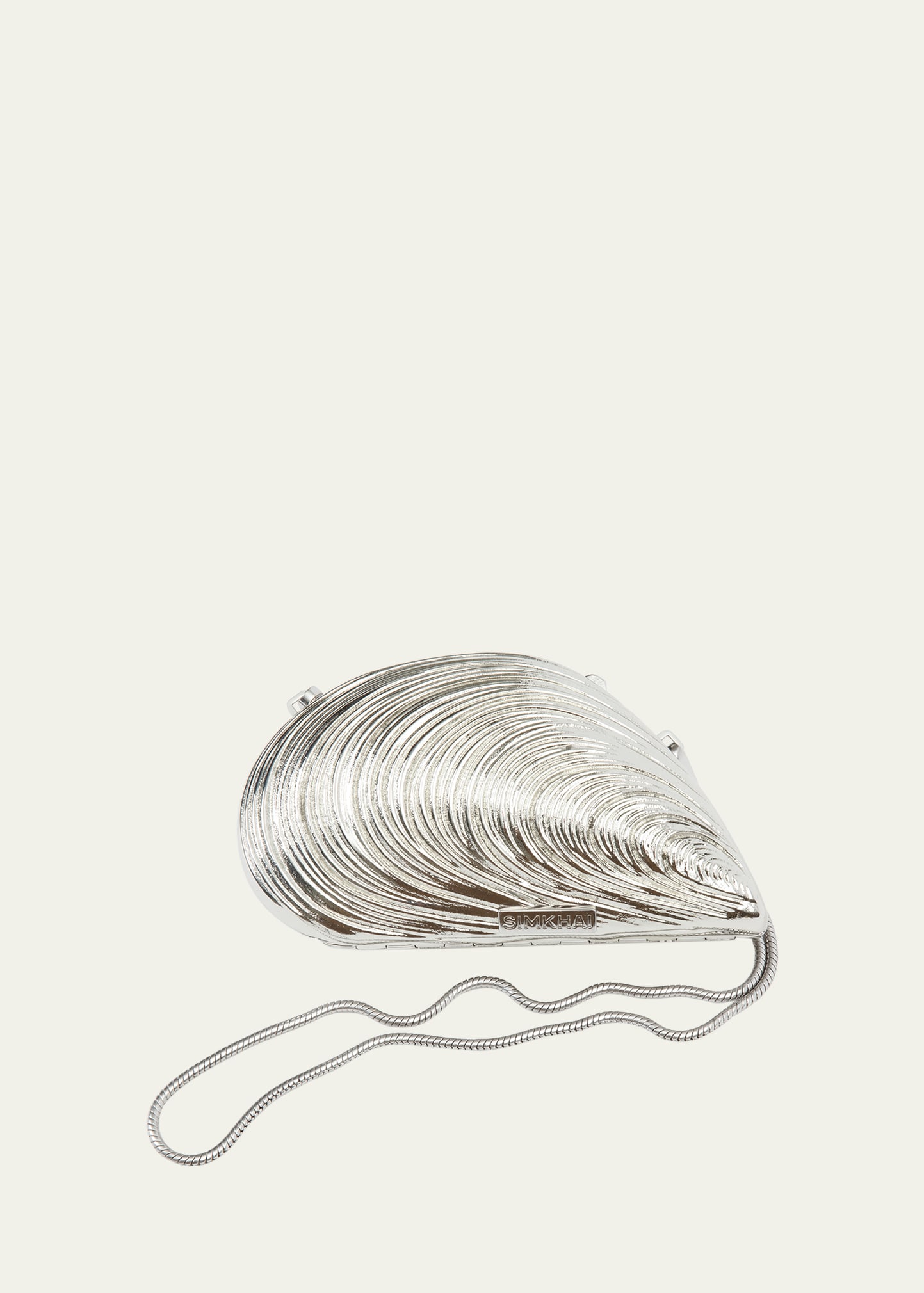 Simkhai Clutch Bridget With Logo Patch And Shell-shaped Design In Metallic Brass For Women In Silver