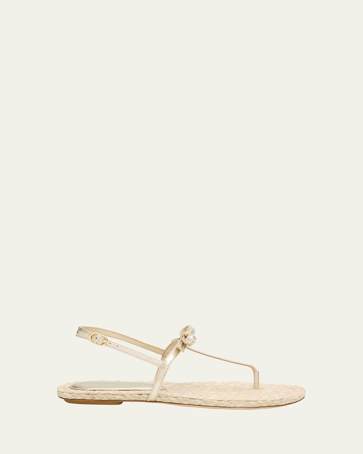 Shop Stuart Weitzman Felicity Metallic Bow T-strap Sandals
