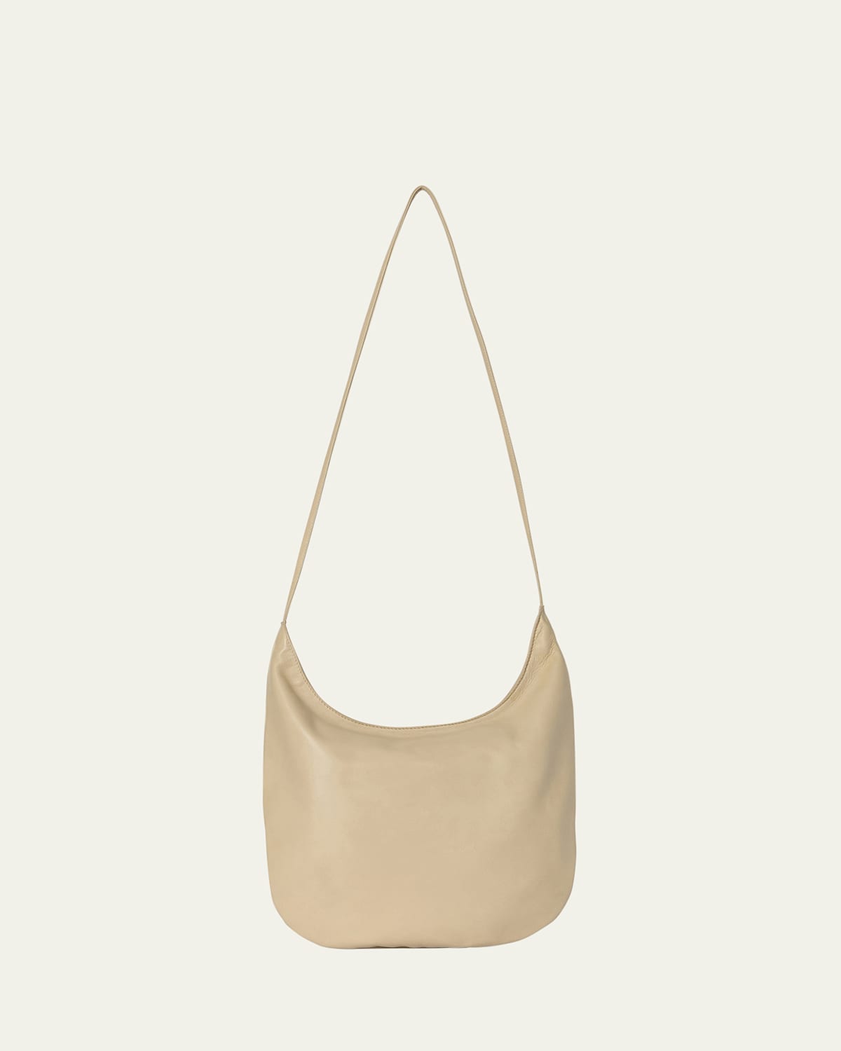 The Row Izzy North-south Crossbody Bag In Silky Leather In Sand