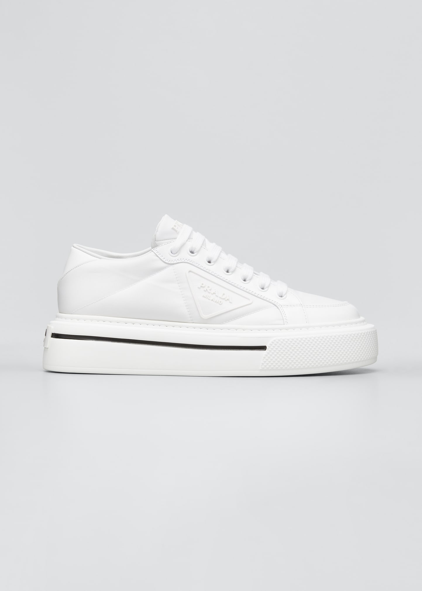 quilted low top sneaker prada