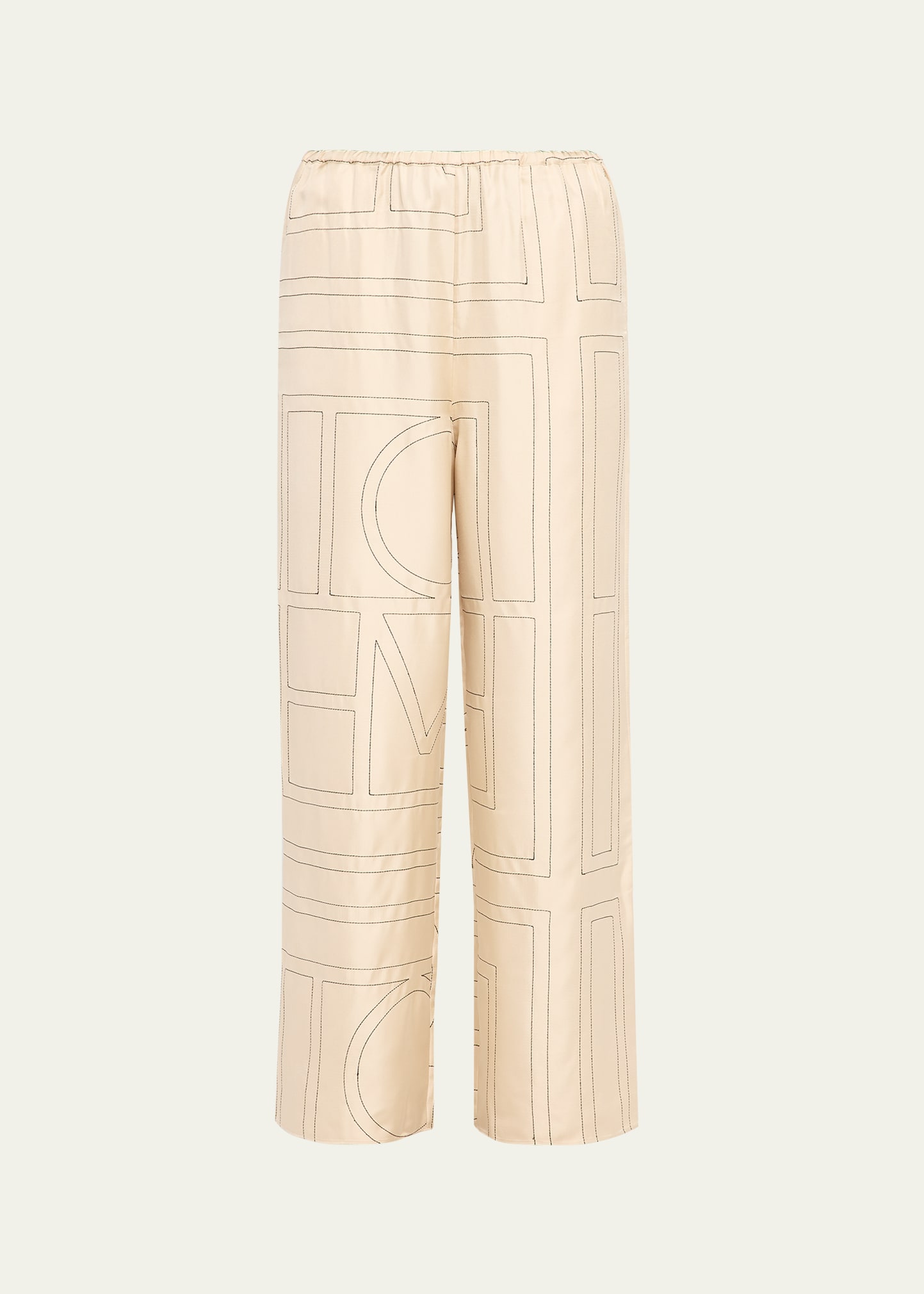 Shop TOTEME Monogram silk pants on Rinascente