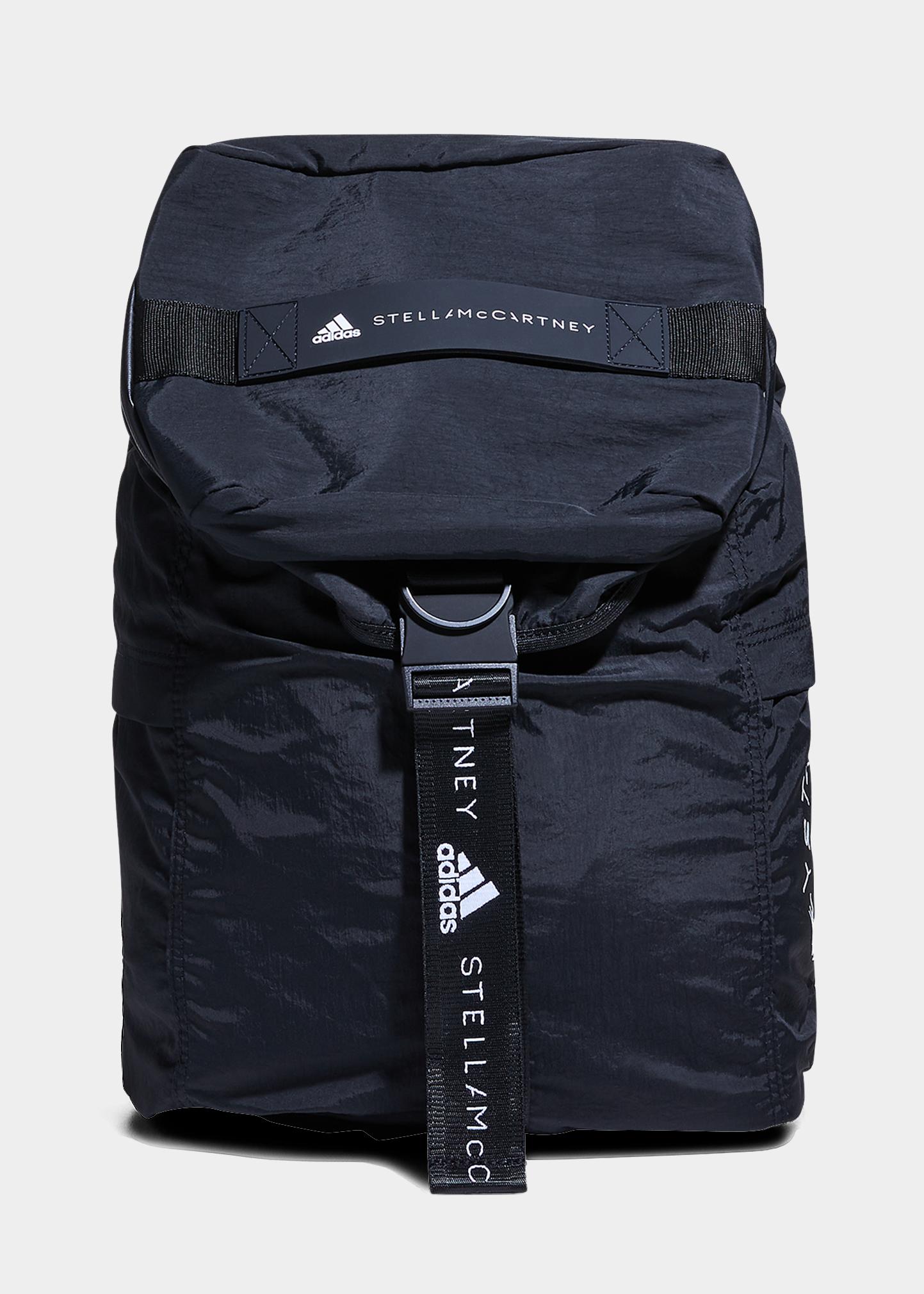 adidas by stella mccartney weekender backpack 24/7 BAG, 10.5" x 19.75" x 11", Semi Solar Slime/Black/Glow Blue Two side pockets store water bottles while a laptop sleeve and interior pockets keep more delicate items stowed away Luxury fashion & independent designers