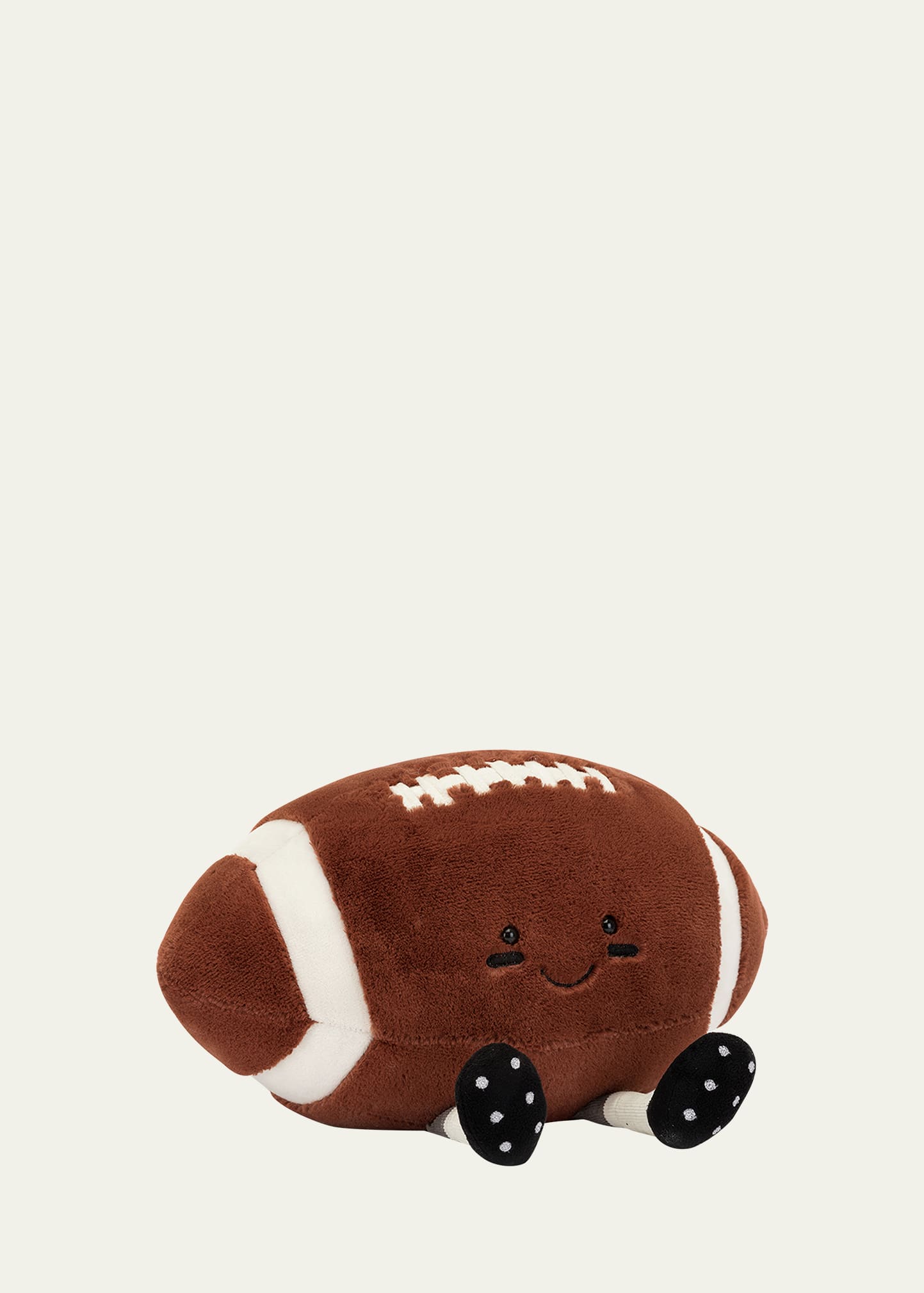 Stuffed football 2024 dog toy