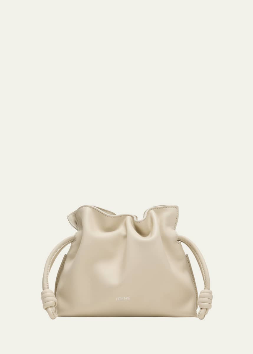 Cream designer clutch bag outlet
