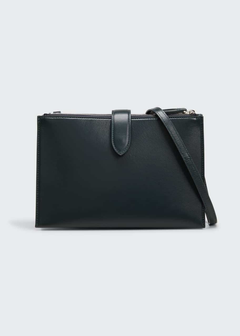 The Row Tasca Zip Crossbody Bag In Calf Leather in Black