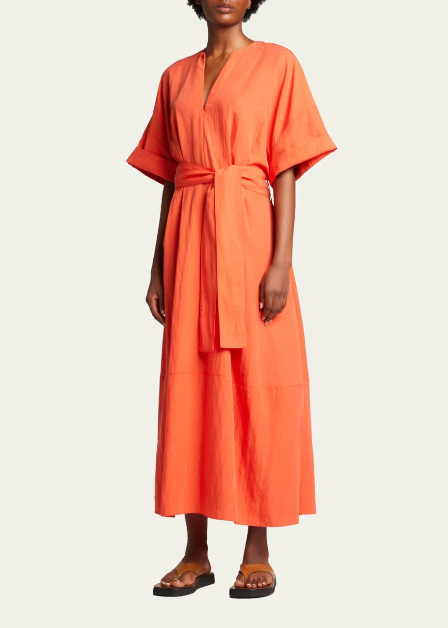 vince orange slip dress Changing up the silk/satin midi dress for Fall with belts and blazers. This  one from @vince is in a color that looks great on everyone. Try styling  these great slip dresses with