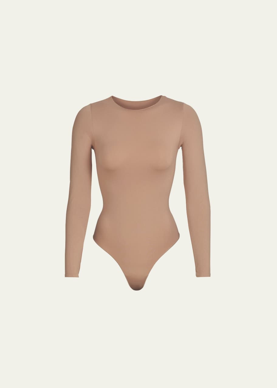 Image 1 of 1: Essential Smoothing Long-Sleeve Thong Bodysuit