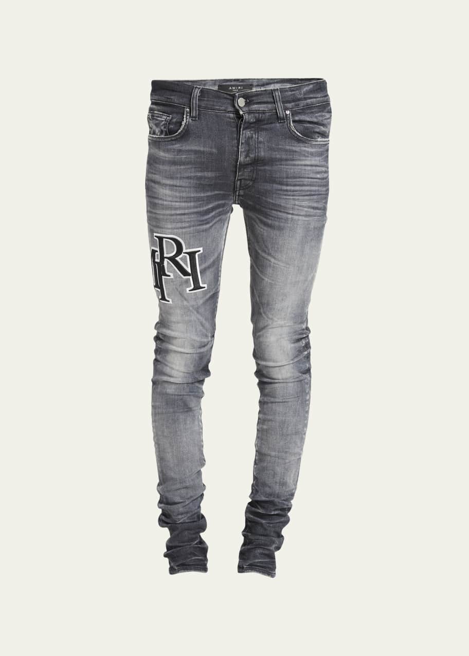 Amiri Men's Faded Skinny Jeans with Staggered Logo