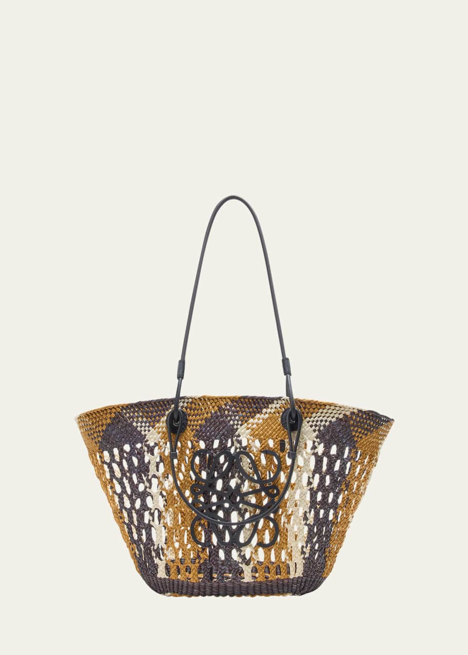 Image 1 of 1: x Paula’s Ibiza Medium Anagram Ajoure Basket Tote Bag in Straw