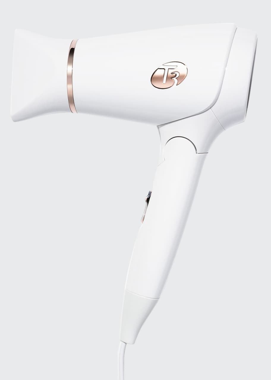 Image 1 of 1: Featherweight Compact Folding Hair Dryer w/ Dual Voltage