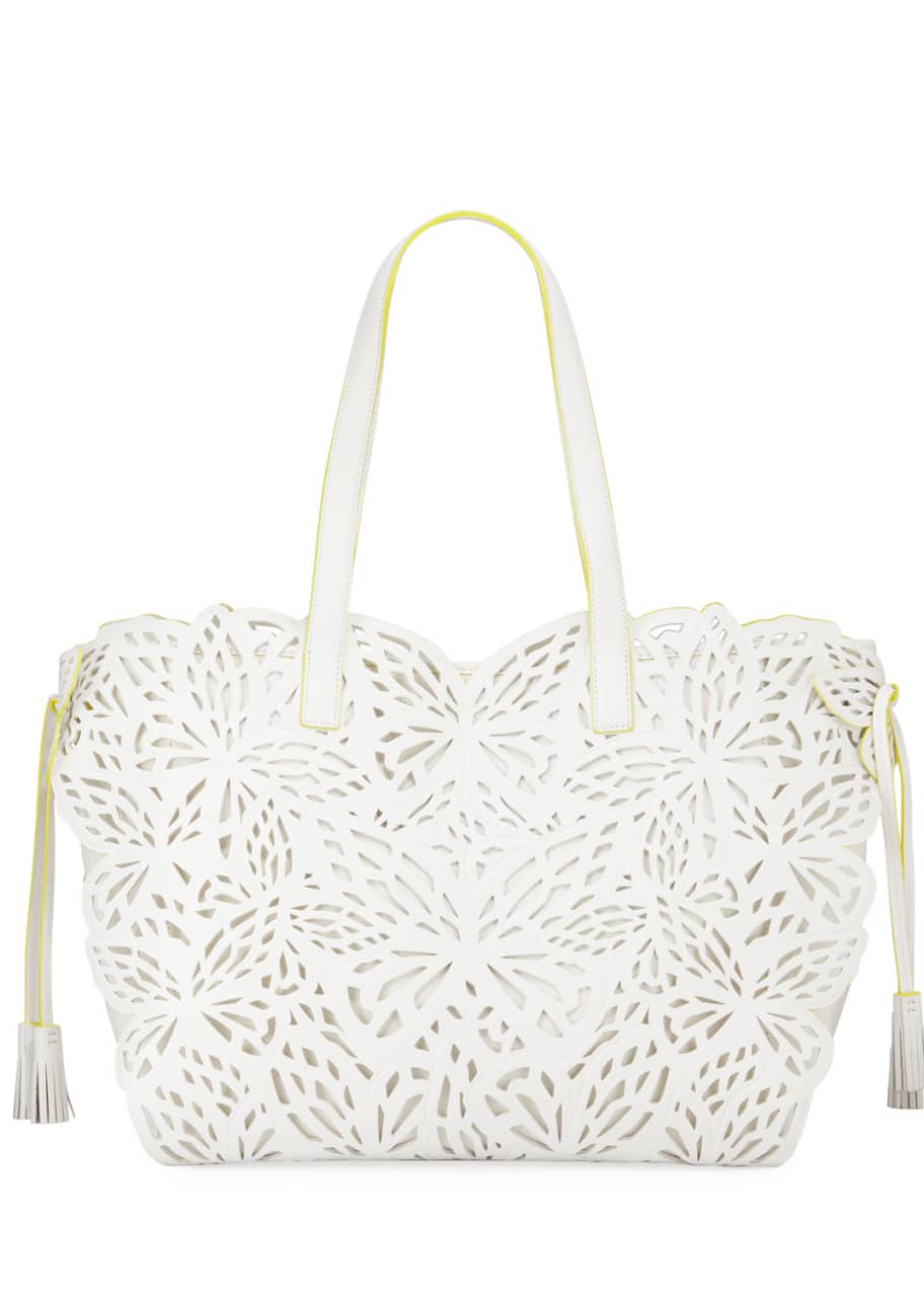 Image 1 of 1: Liara Canvas Laser-Cut Leather Butterfly Tote Bag
