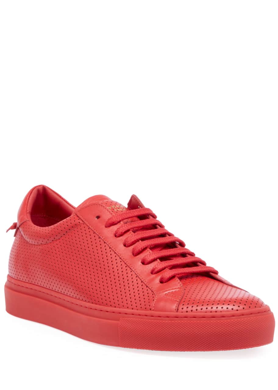 Givenchy perforated low sneakers in leather on sale