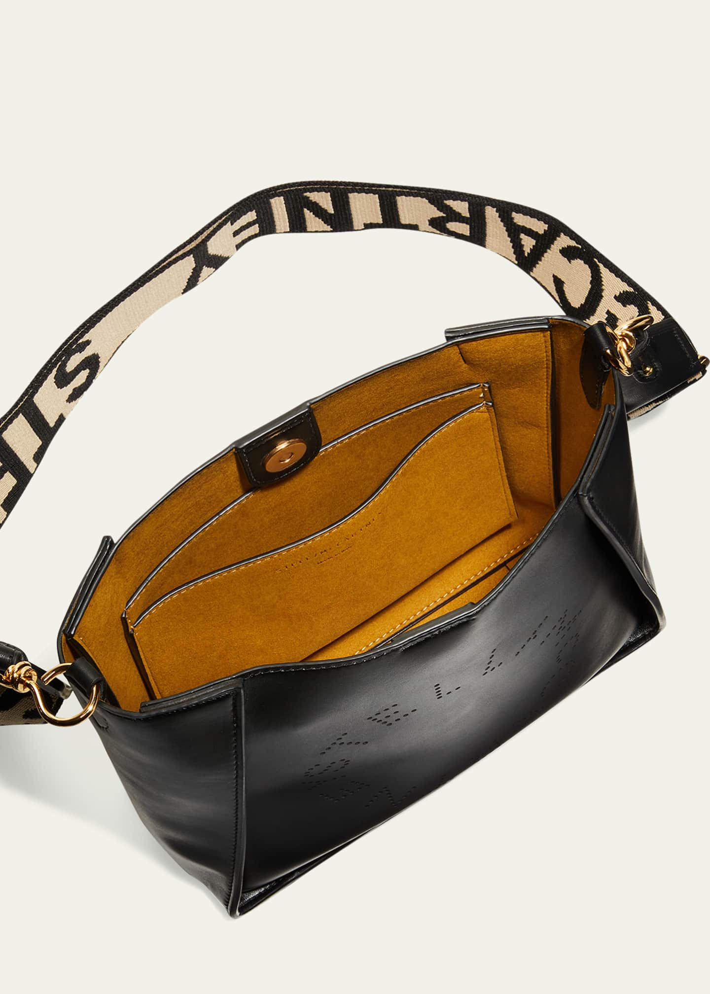 Stella mccartney perforated logo hotsell alter napa crossbody bag
