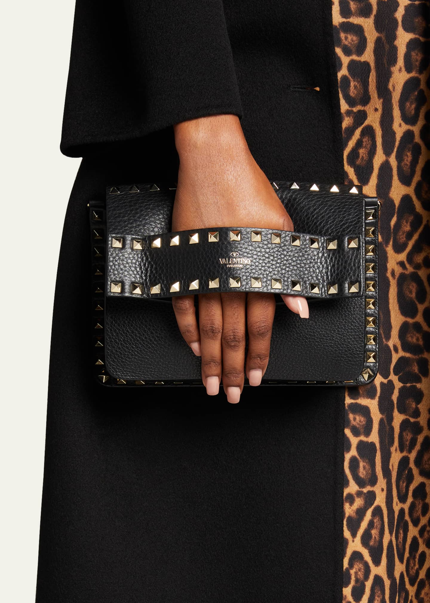 Black Rockstud leather clutch bag, Valentino Garavani