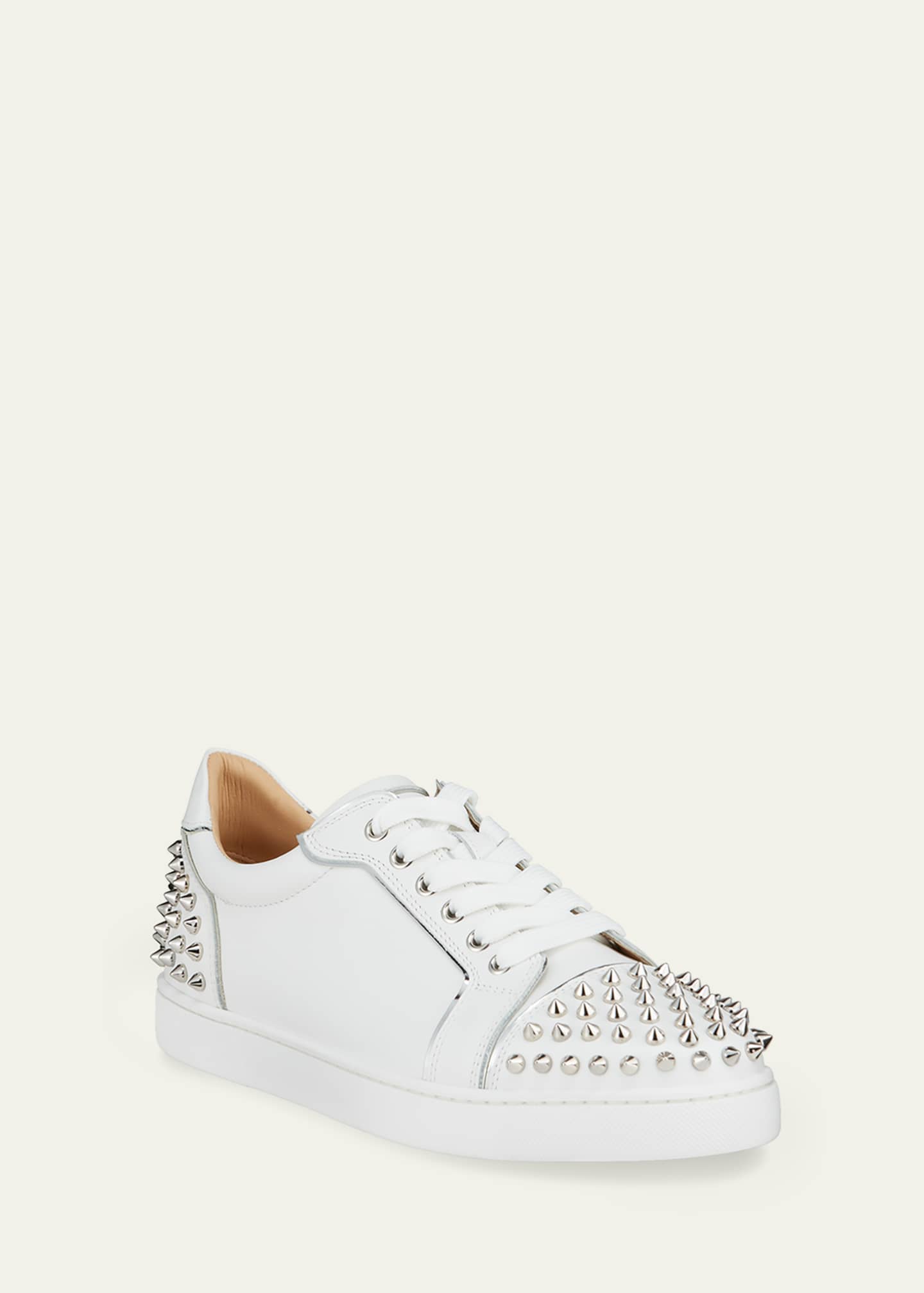 White low top deals louboutins spikes