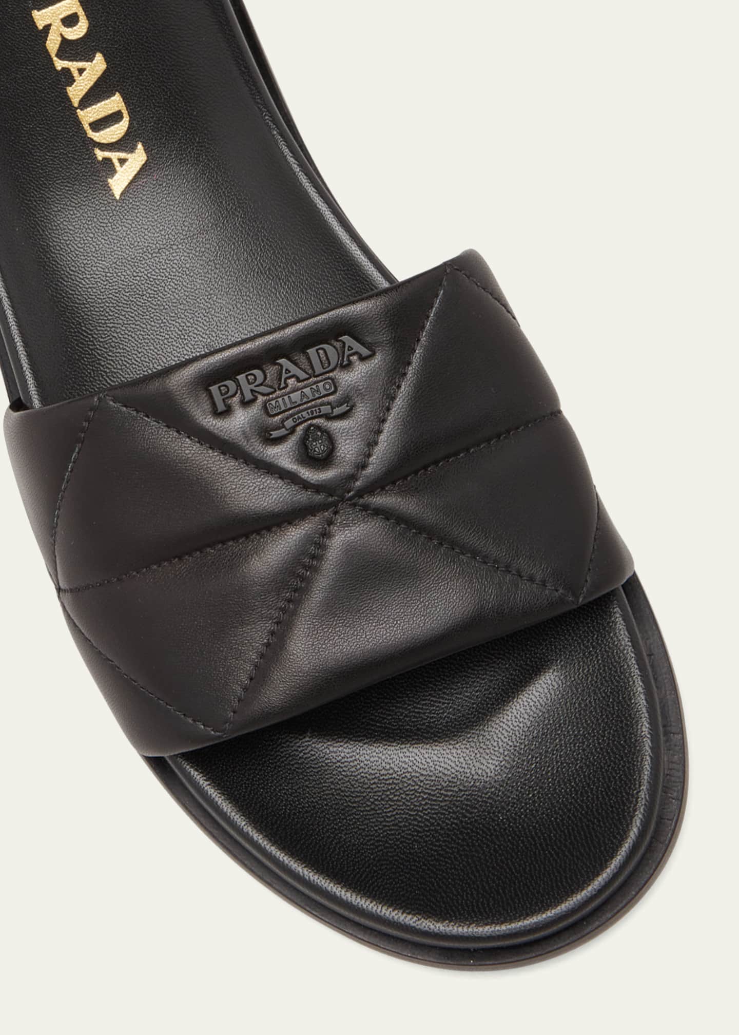 Prada quilted discount leather slides