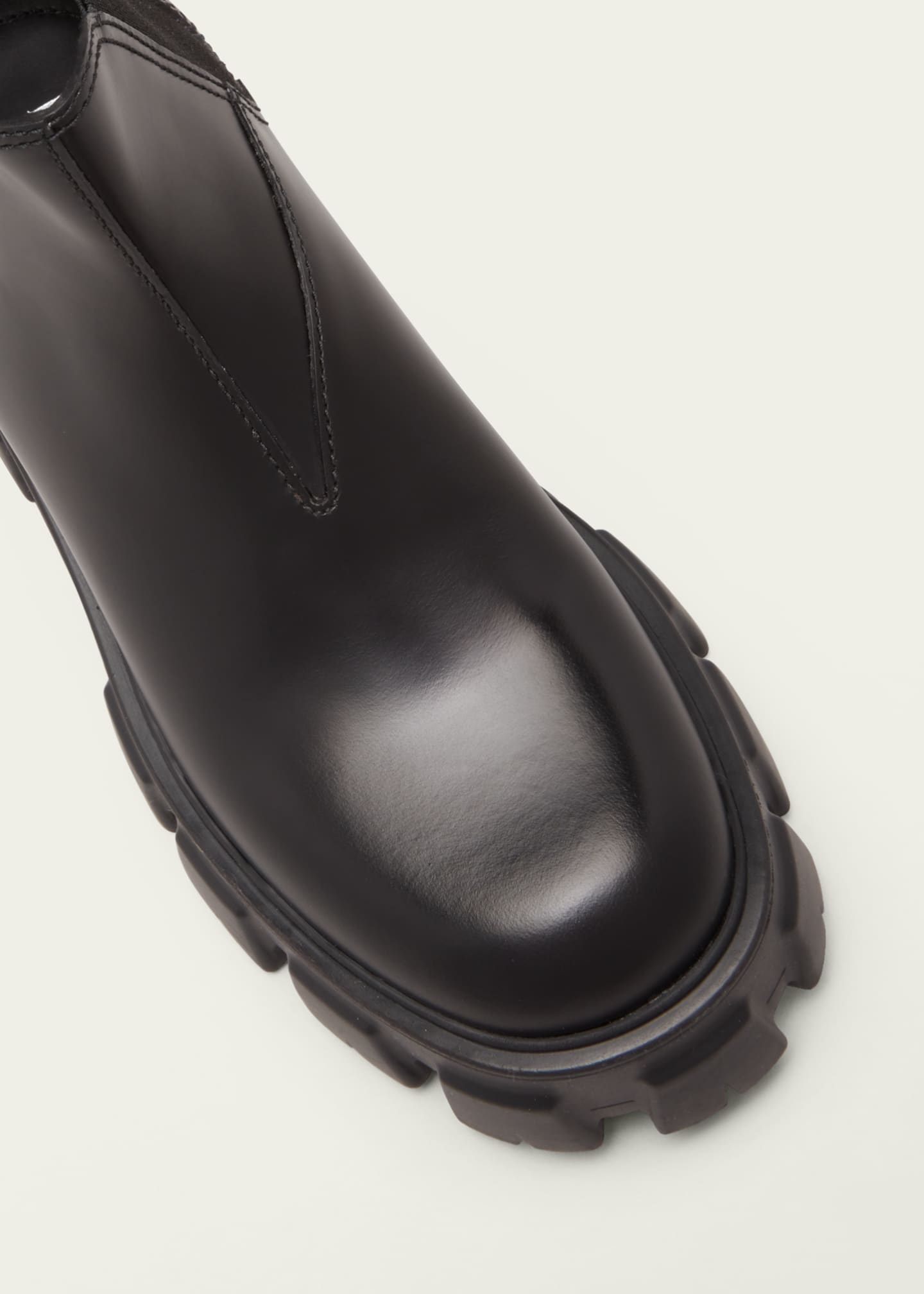 Prada monolith leather ankle boots hotsell