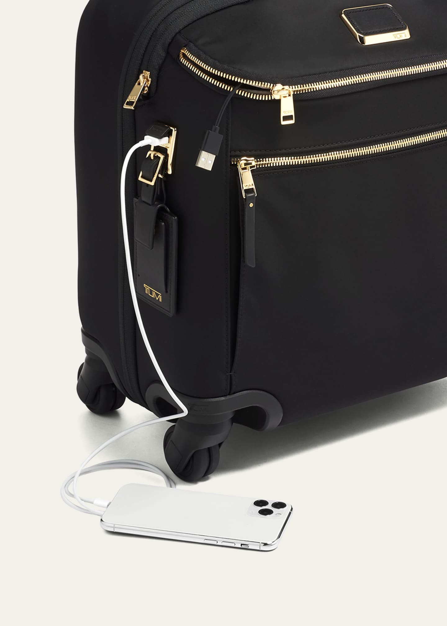 Tumi black and gold luggage sale