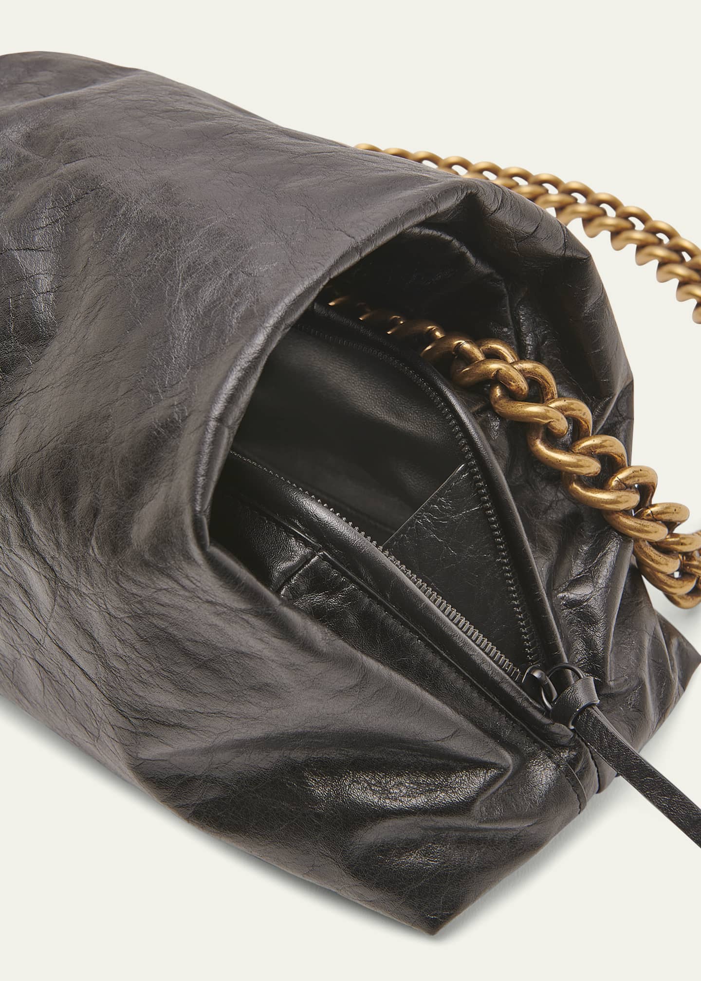 Balenciaga puffer clutch best sale