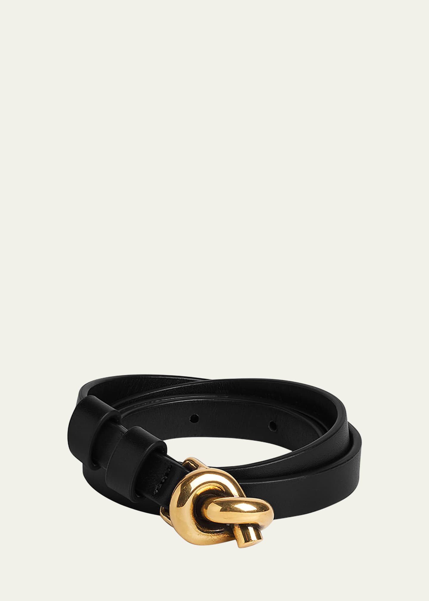 gold-buckle leather belt