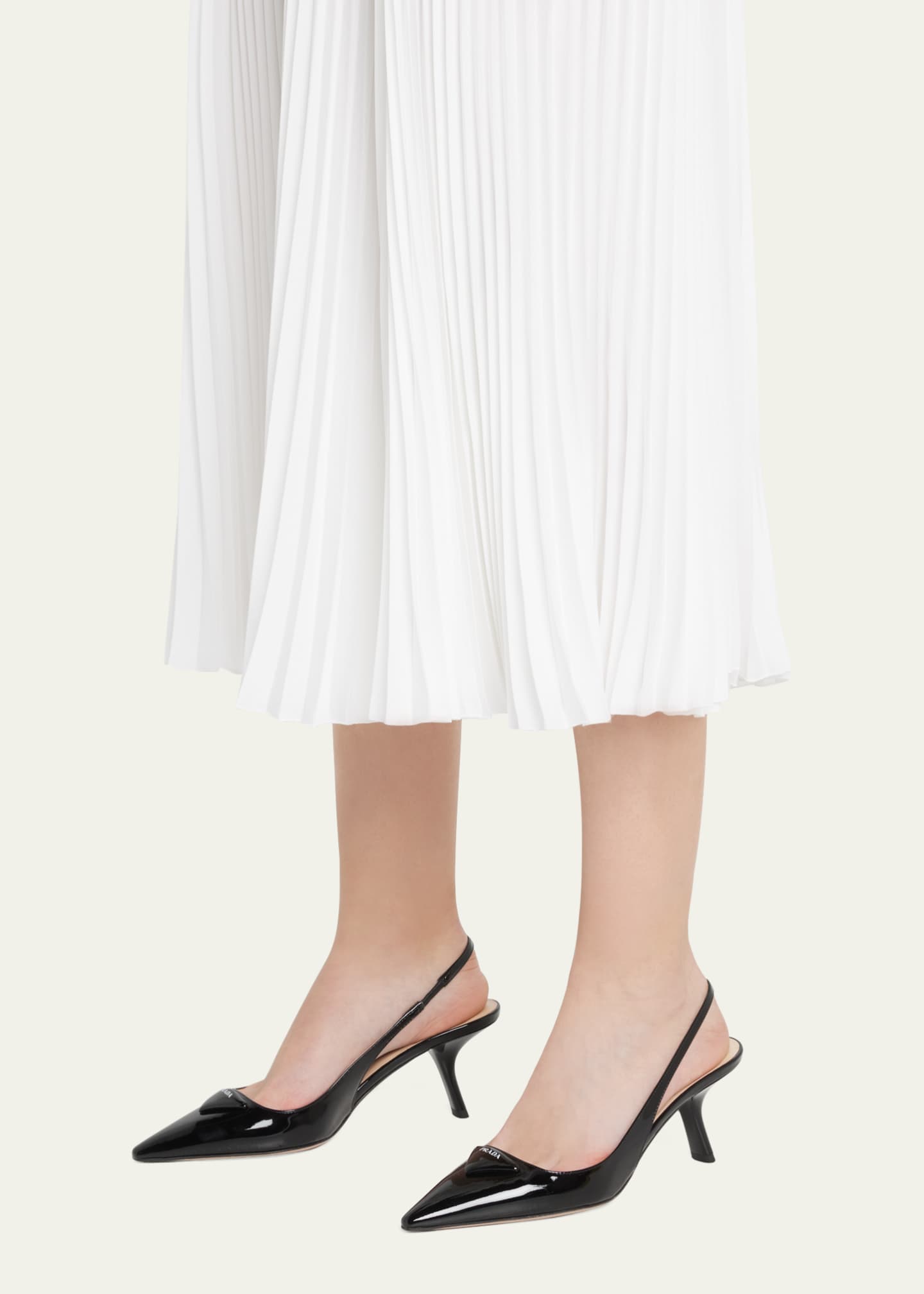 Logo patent leather slingback pumps