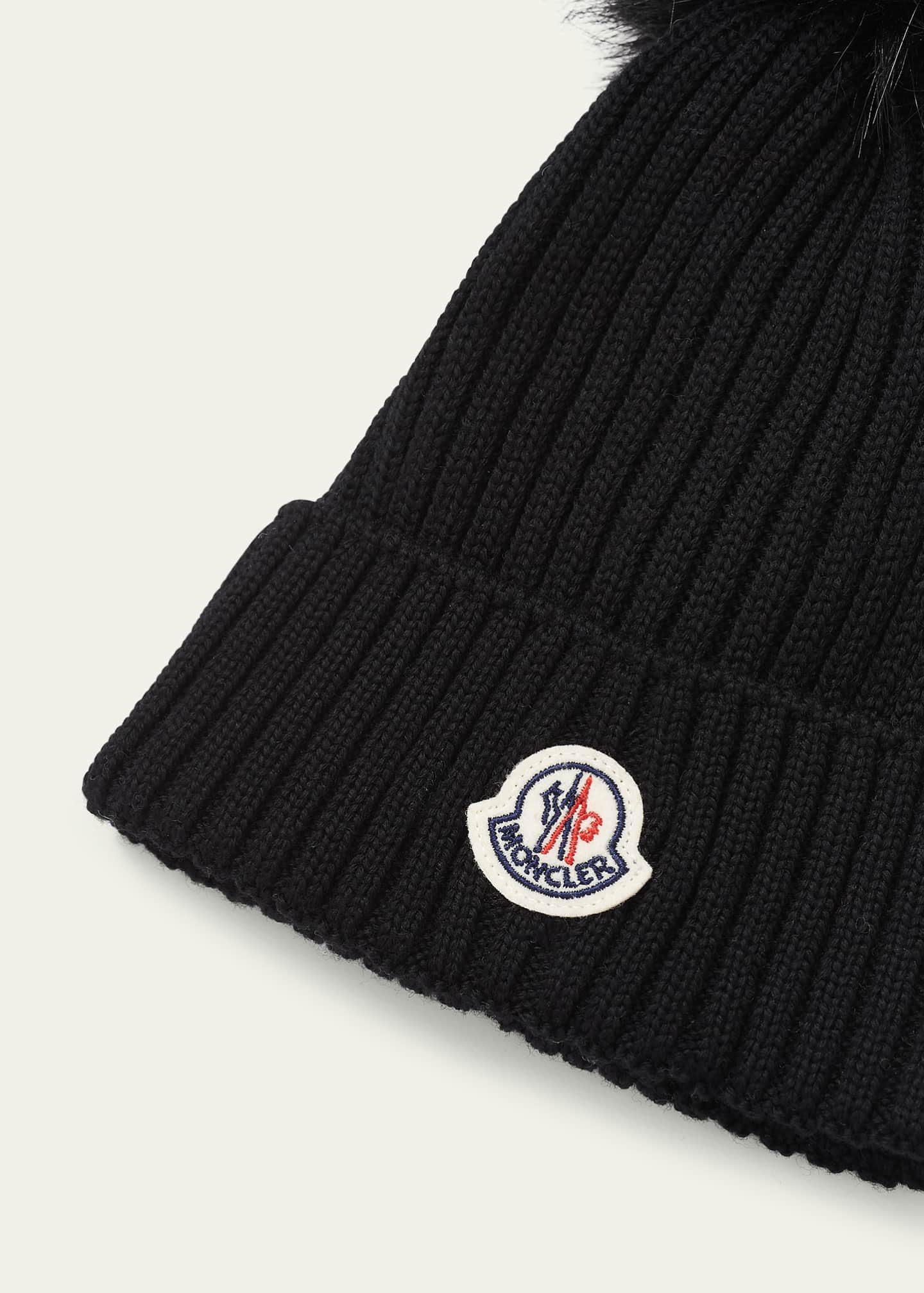 Moncler black pom pom hat outlet