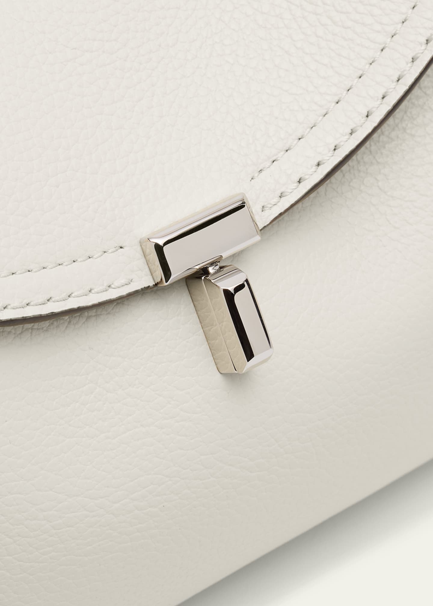 Toteme T-Lock Clutch Bag in Pebble Grain Leather - Bergdorf Goodman