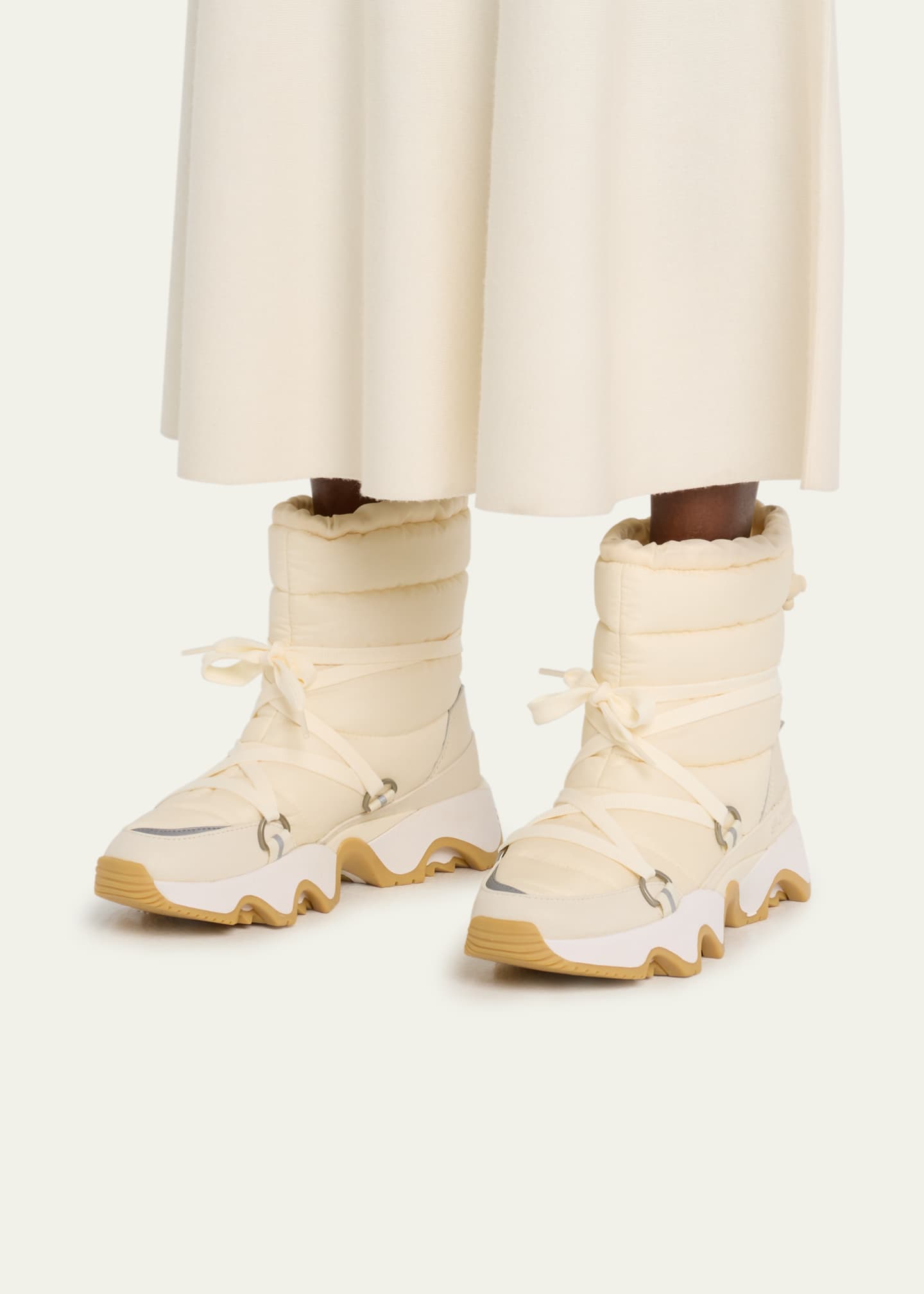 Louboutin puffy boots 2025