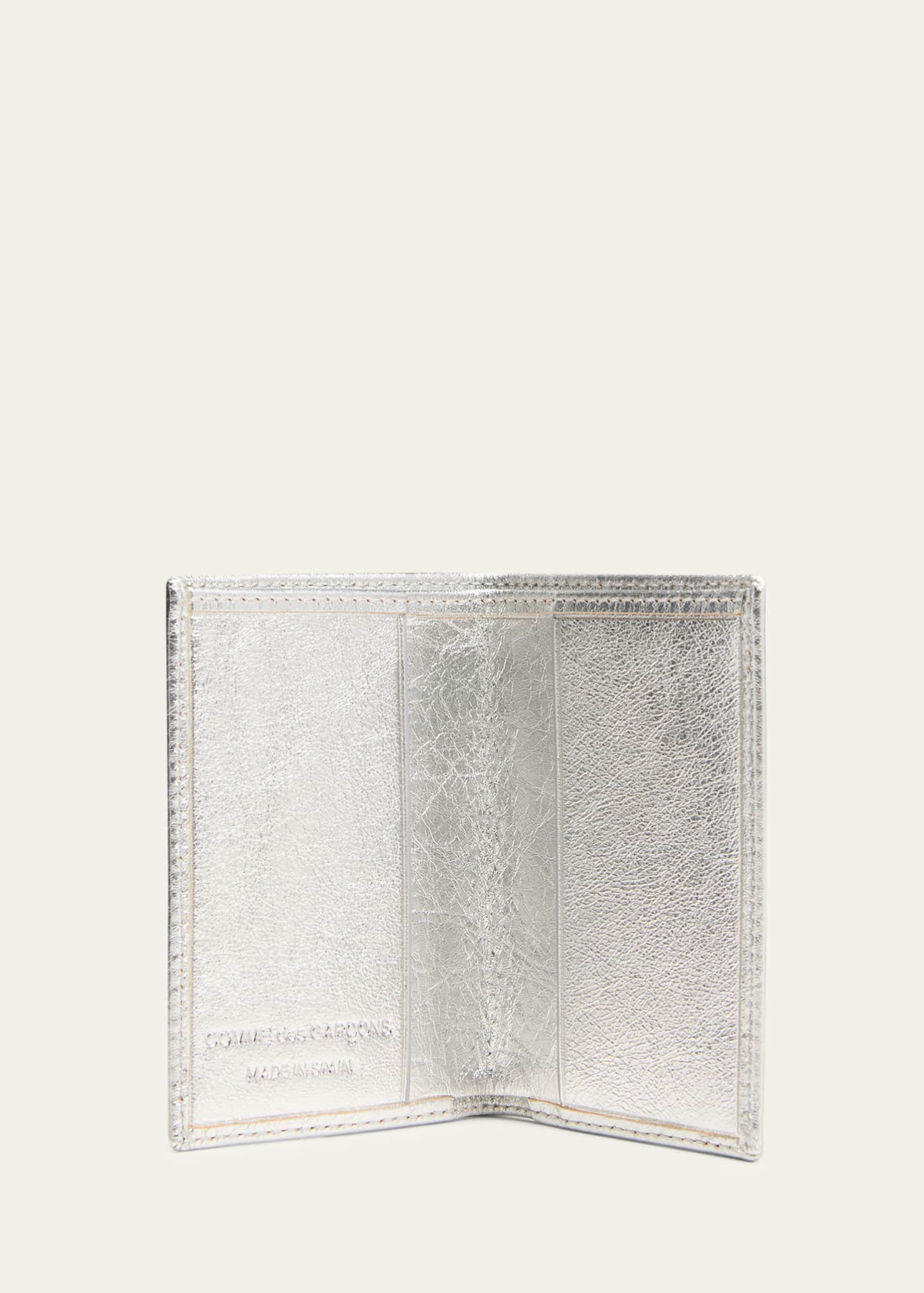 Comme de garcons passport holder deals