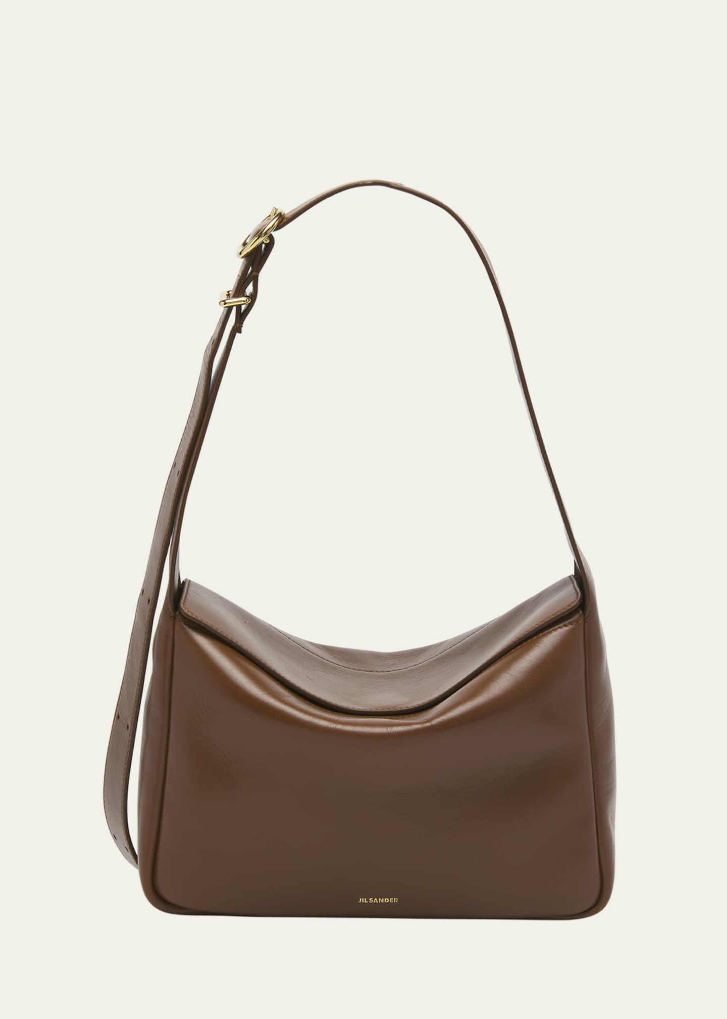 Flap leather messenger bag in black - Jil Sander