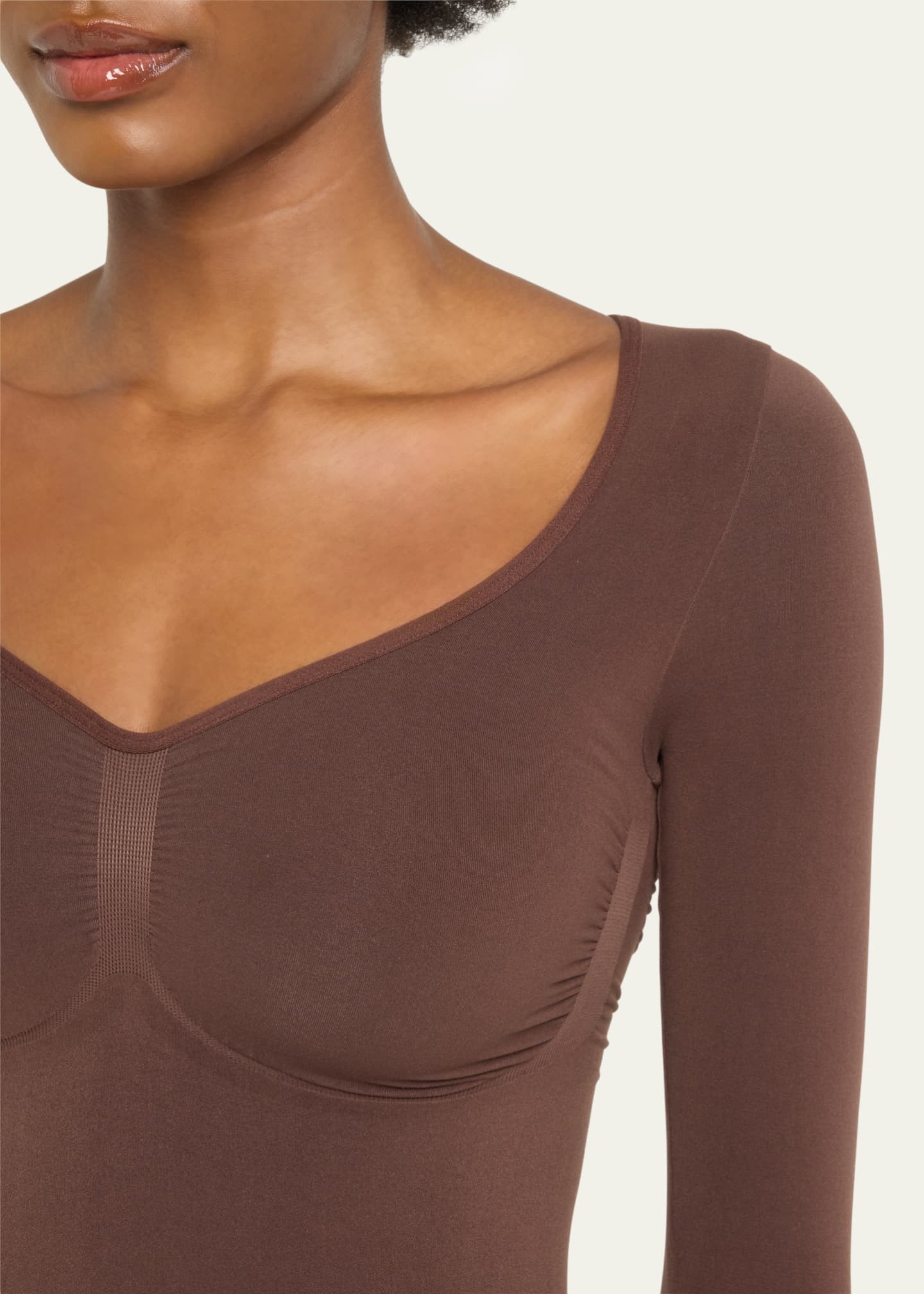 Track Seamless Sculpt Long Sleeve Thong Bodysuit - Sand - S at Skims