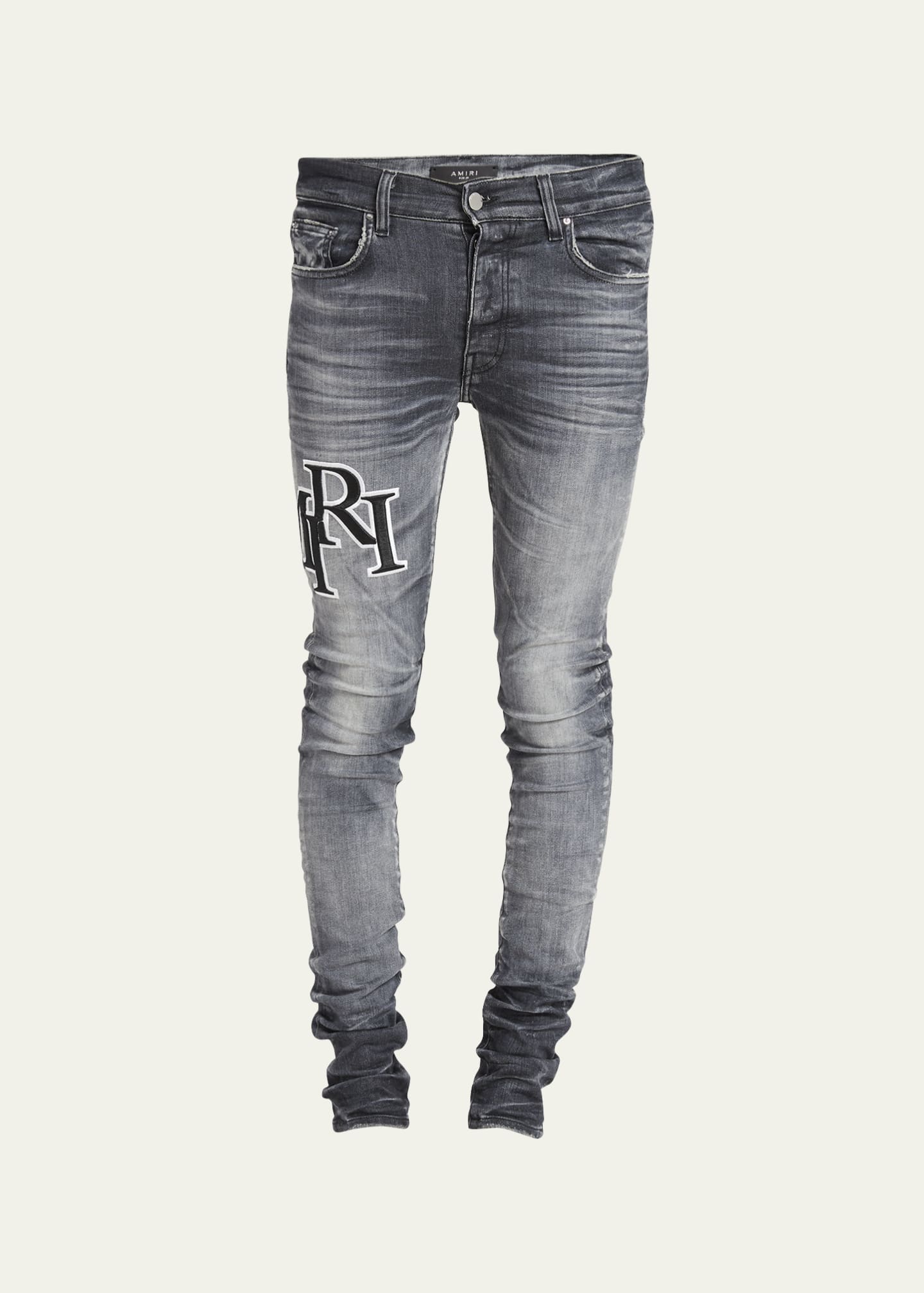 Amiri Men's Faded Skinny Jeans with Staggered Logo - Bergdorf Goodman