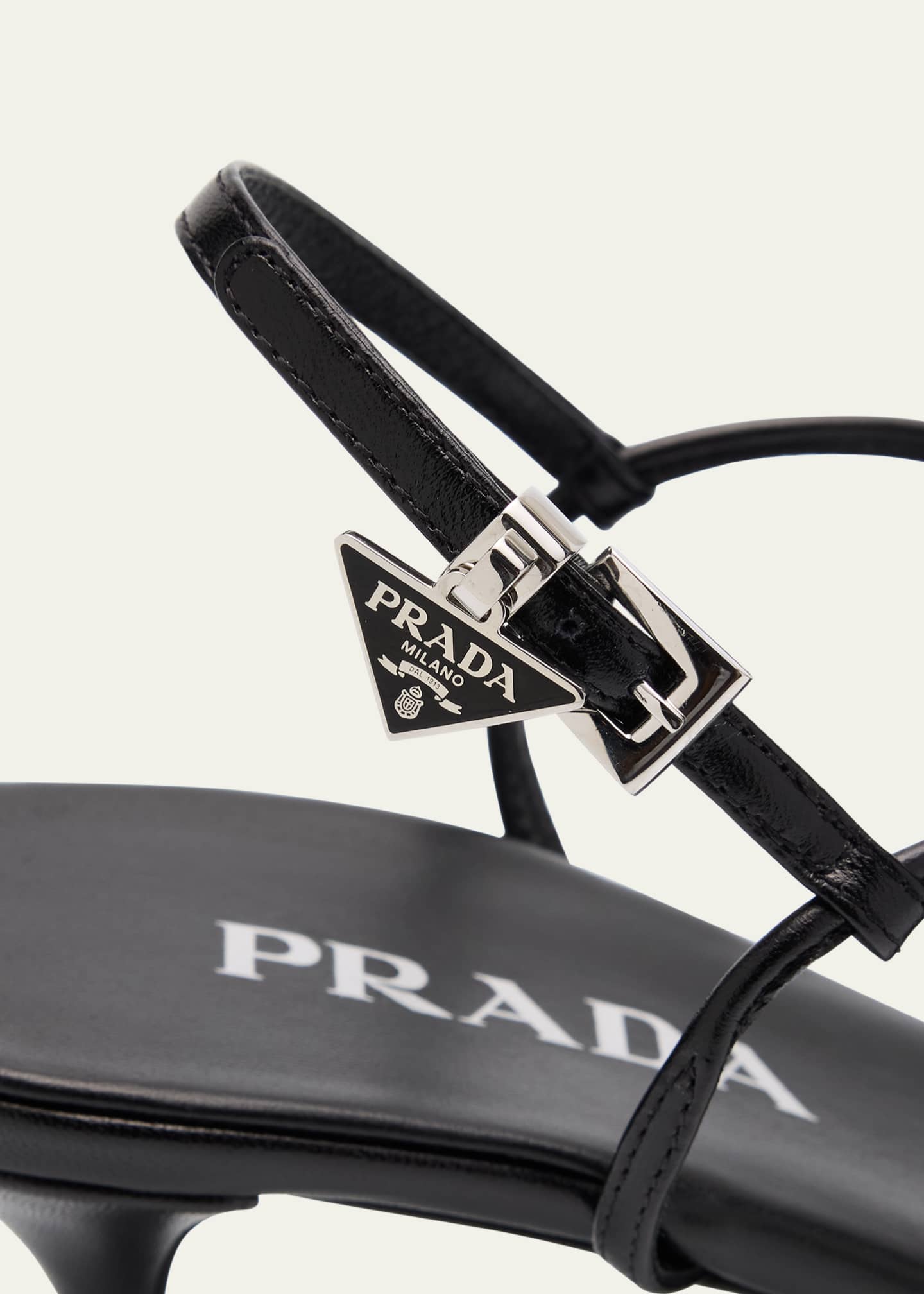 Capretto Strappy Leather Sandals with Triangle Logo Charm