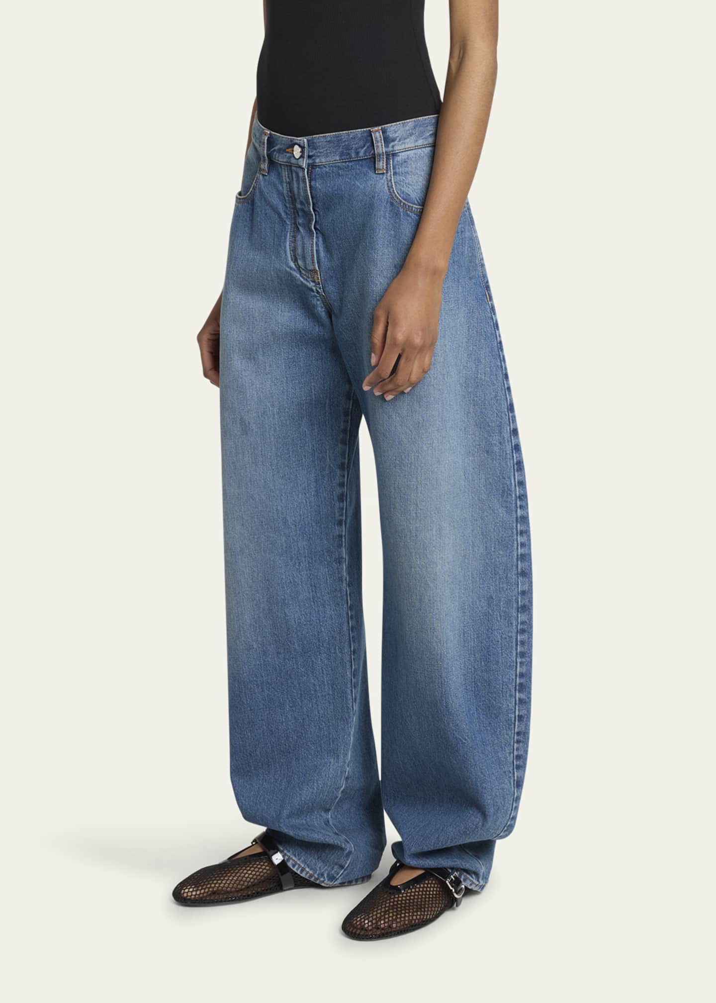 デニム・ジーパン ALAIA ROUND LOW-WAIST JEANS ALAIA Rounded Low-Rise Jeans - Bergdorf Goodman