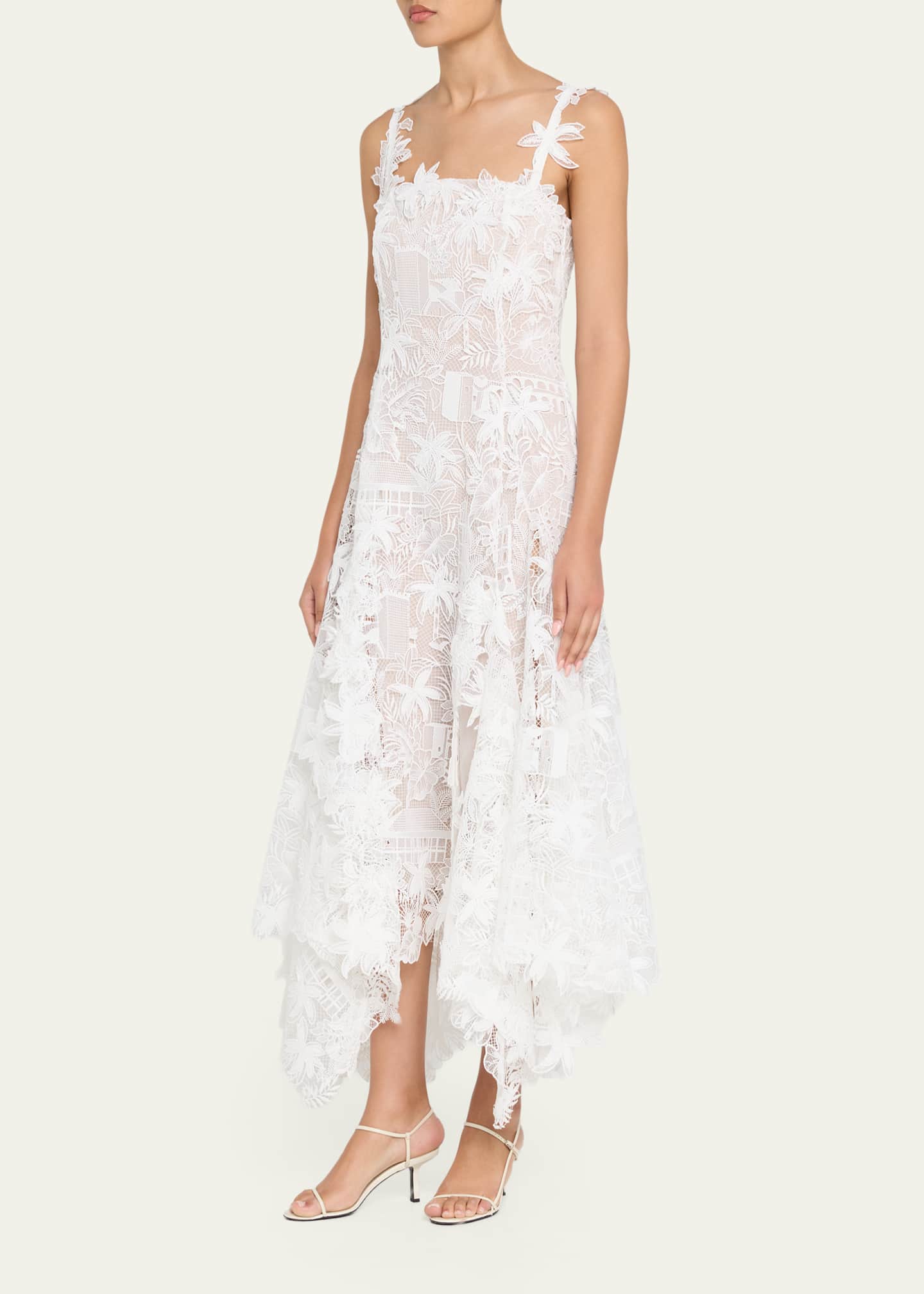oscar de la renta white lace dress In full bloom. Floral embroideries lend lightness to a sweetheart faille  cocktail dress. #odlrbridal Discover Spring 2026 Bridal at the link in bio